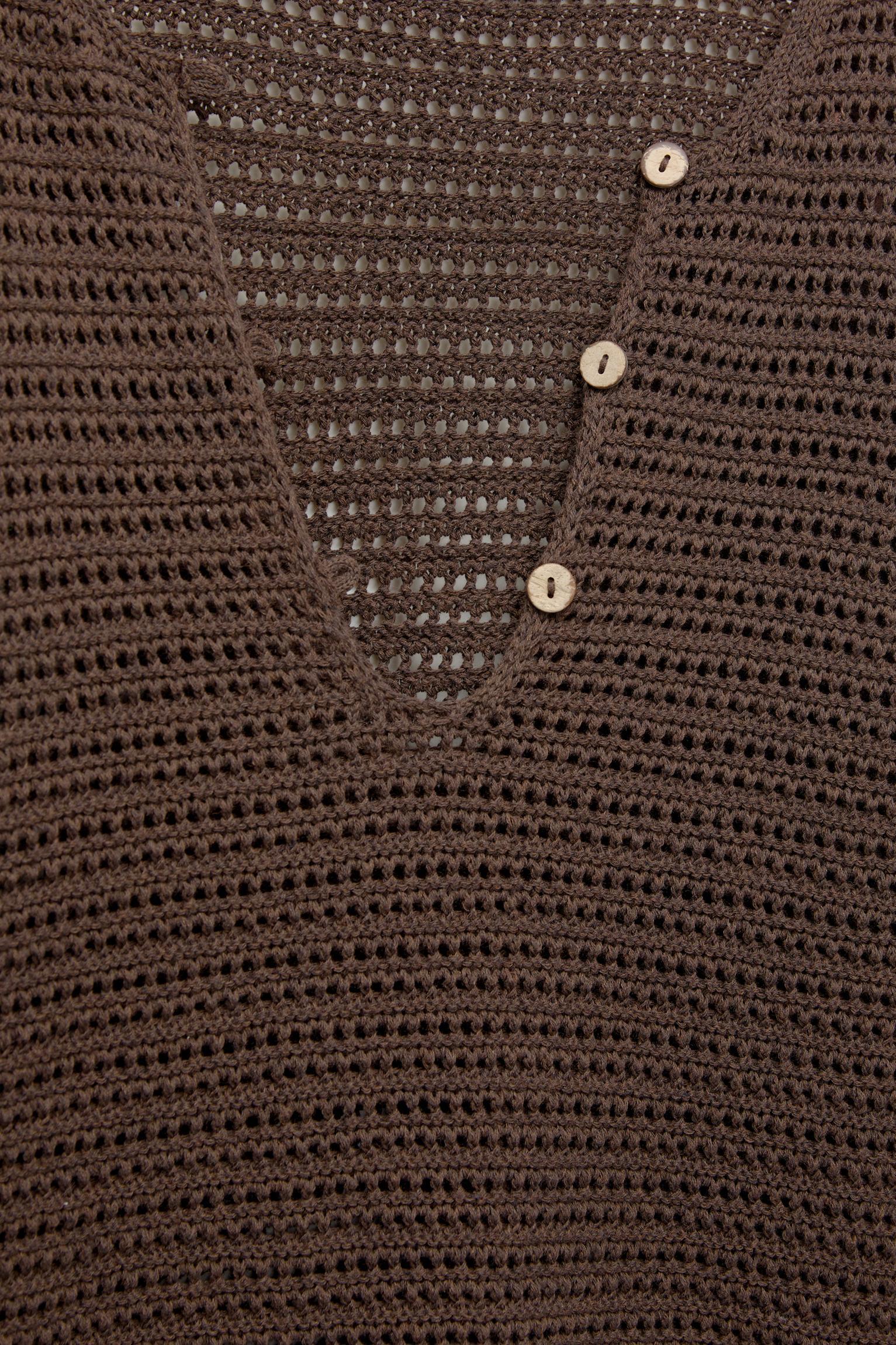 Open knit sweater with buttons Product Image