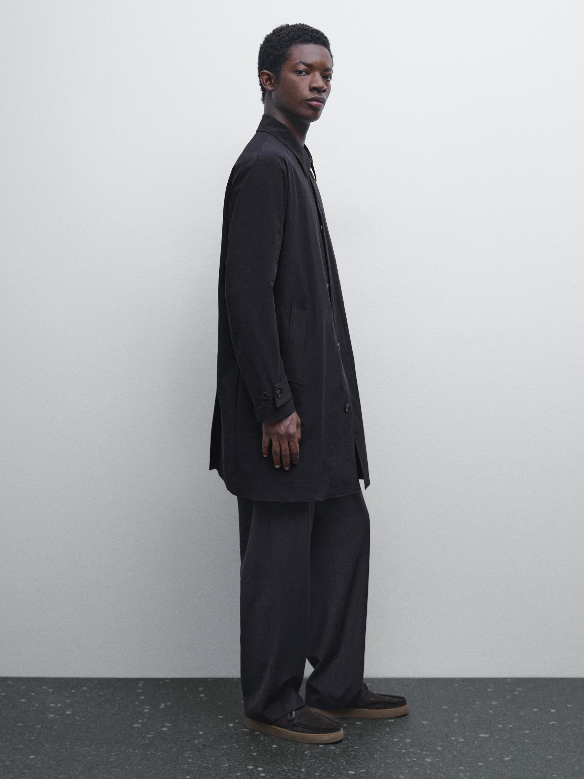 Lightweight trench coat with hidden buttons Product Image