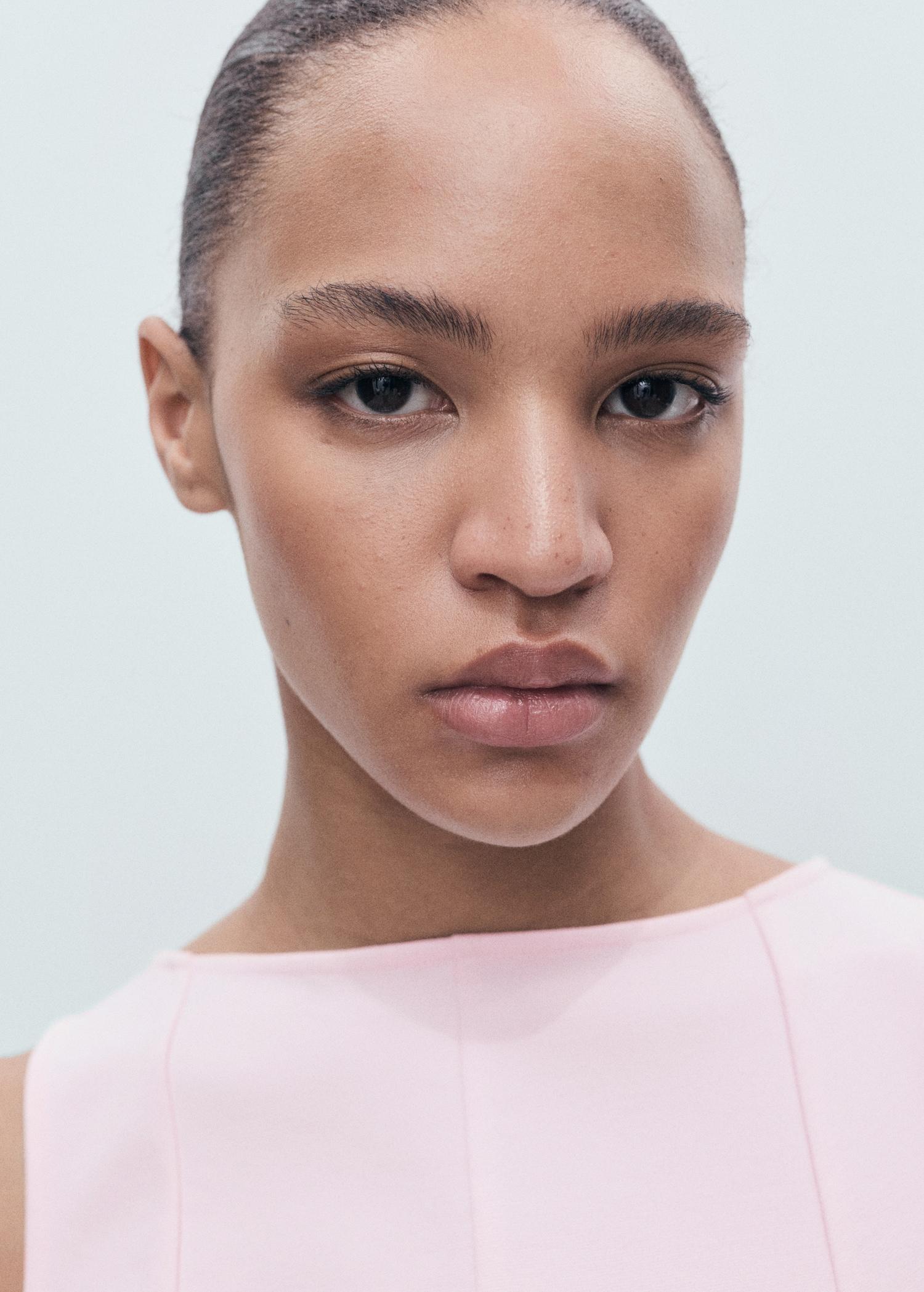 Peplum top with seam detail - Women | MANGO USA Product Image