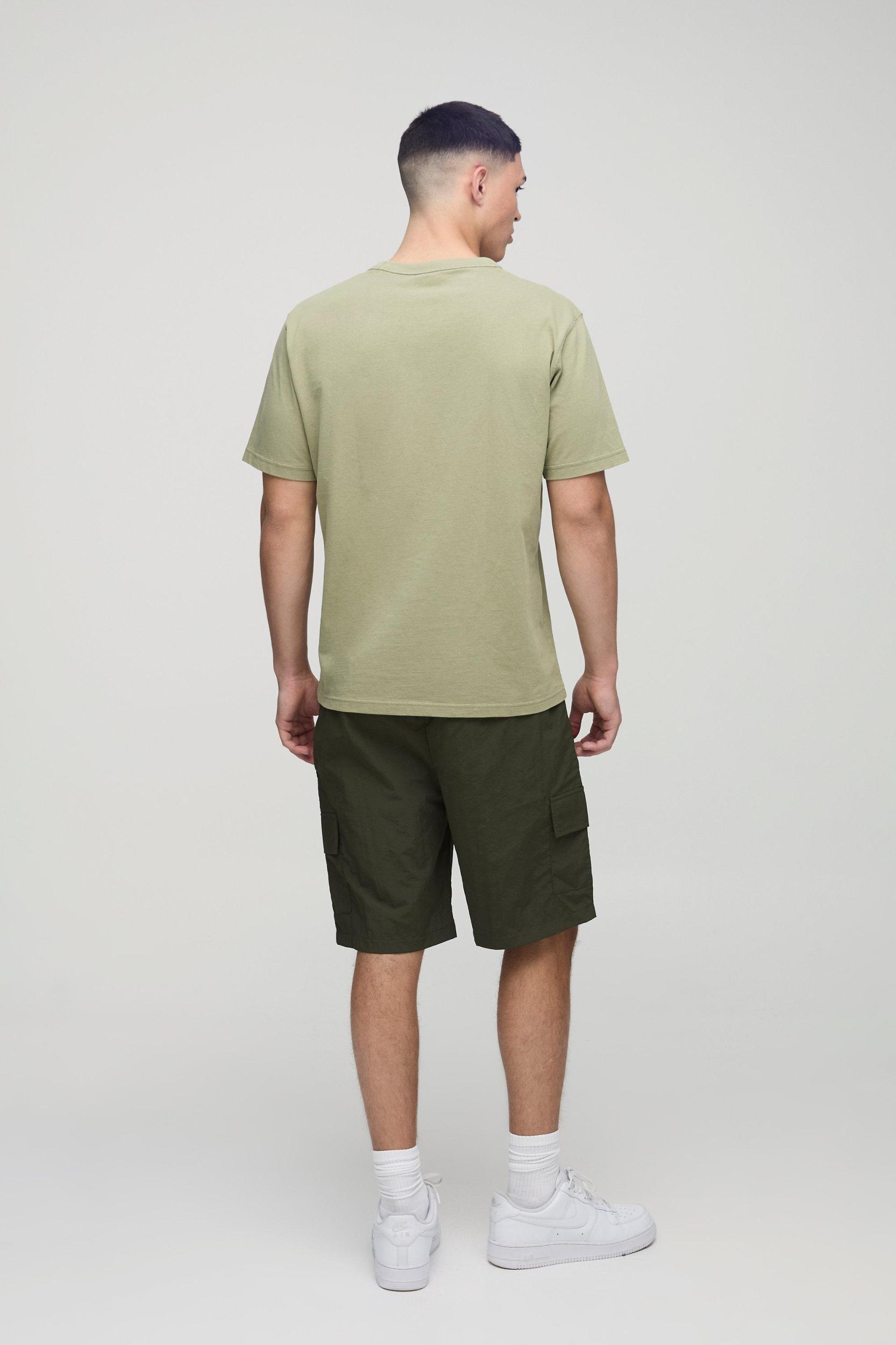 Elasticated Waist Relaxed Mid Length Crinkle Nylon Cargo Shorts | boohooMAN USA Product Image