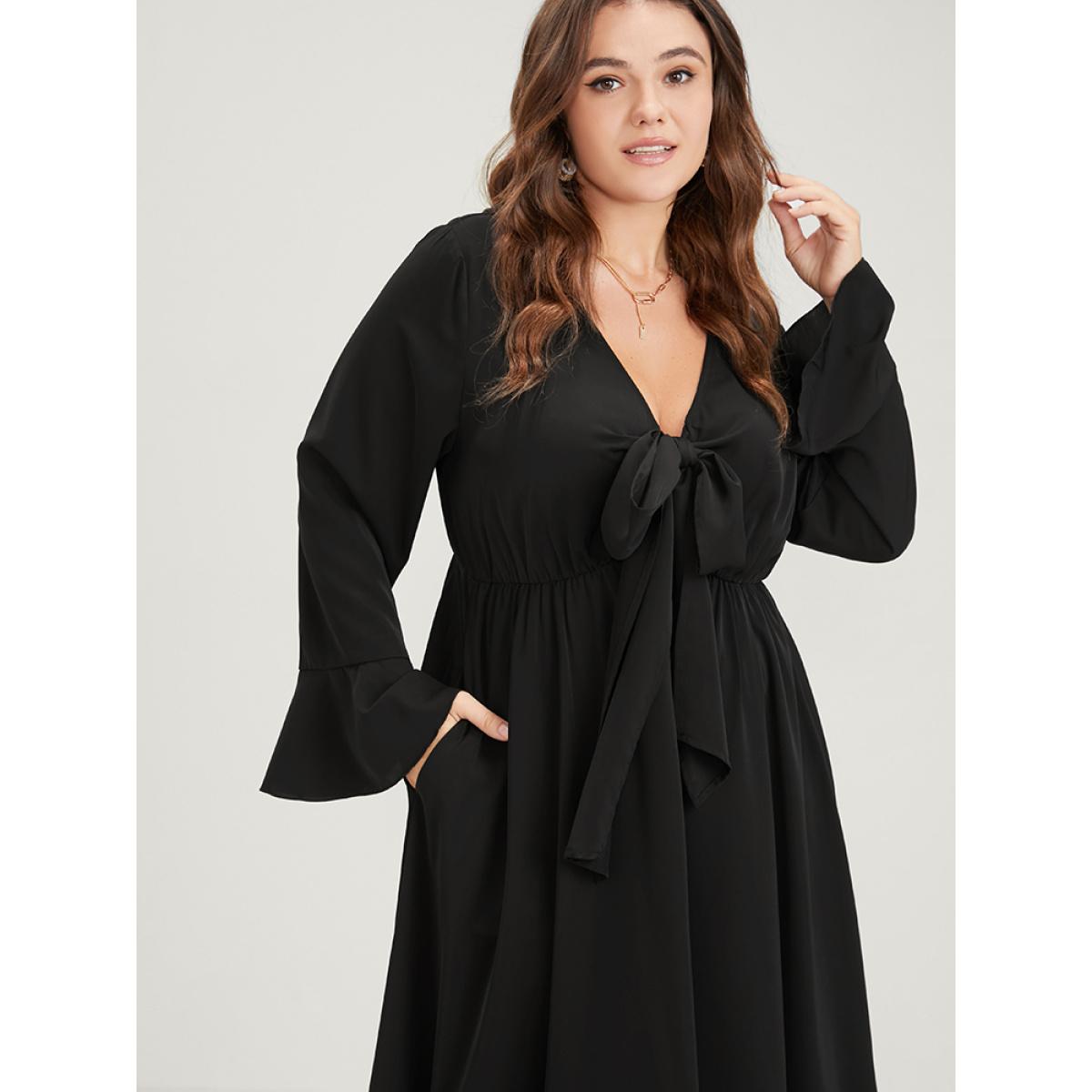 Plus Size Solid Bell Sleeve Pocket Knotted Neck Arc Hem Dress Black Women Elegant Cross straps V-neck Long Sleeve Curvy Long Dress BloomChic 26/4X Product Image
