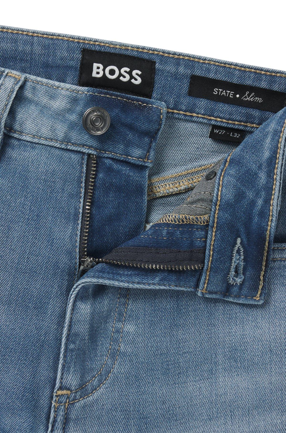 Slim-fit jeans in washed blue stretch denim Product Image