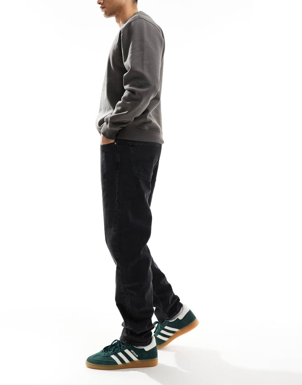 Tommy Jeans Isaac relaxed tapered jeans in black Product Image