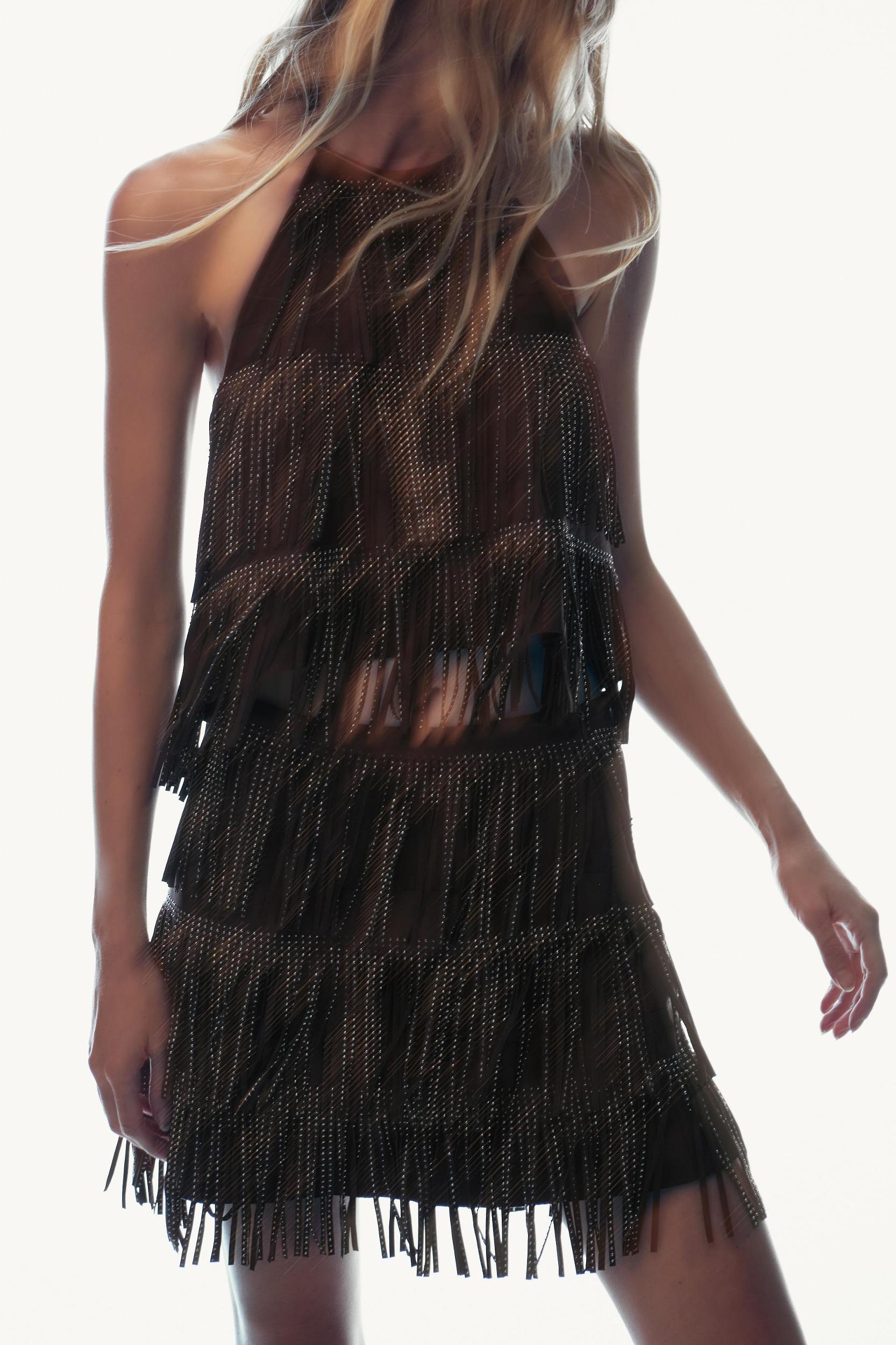 SHIMMERING FAUX SUEDE FRINGE SKIRT Product Image