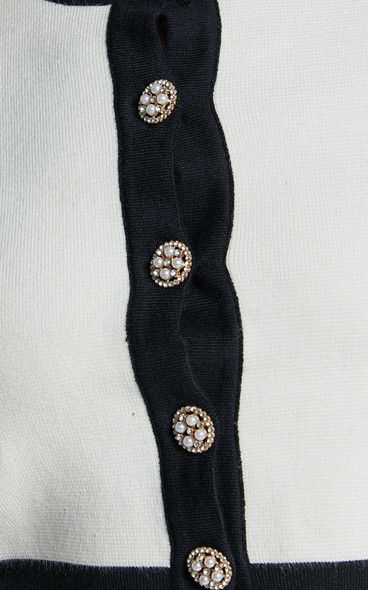 Alyce Cardigan - Button Through Bow Detail Contrast Knit Cardigan in White & Black Product Image