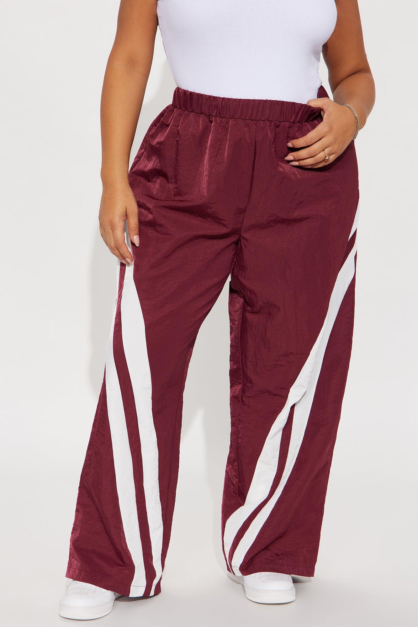Follow The Curve Windbreaker Track Pant - Burgundy Female Product Image