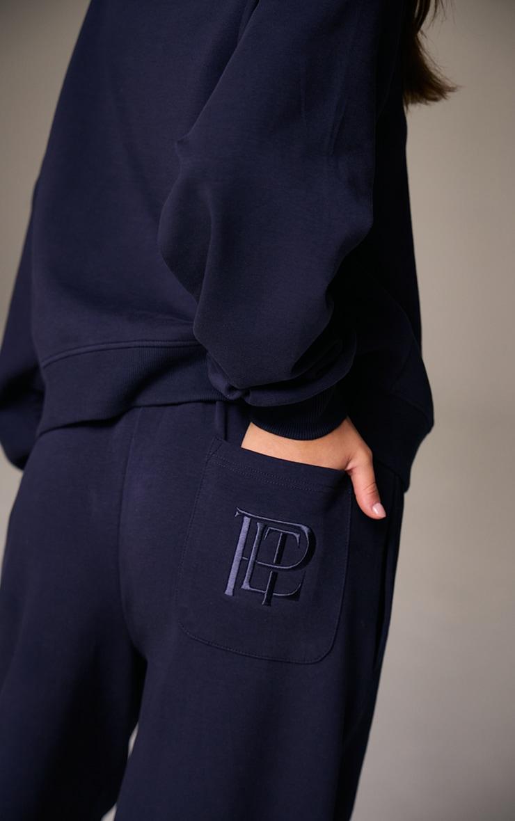 Navy Embroidered Interlock Wide Leg Sweatpant Product Image
