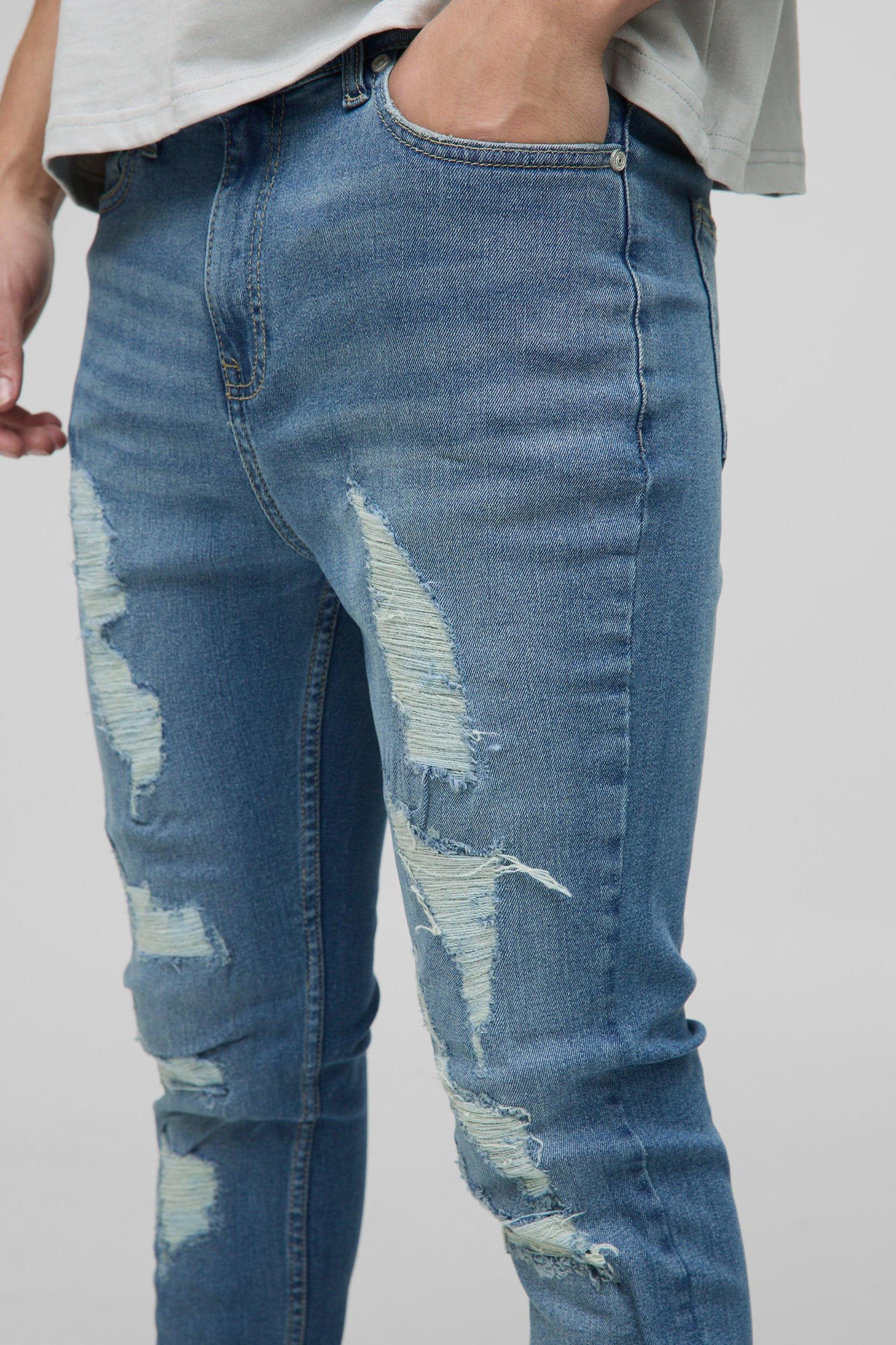 Skinny Stretch Washed Stacked Ripped Jeans | boohooMAN USA Product Image