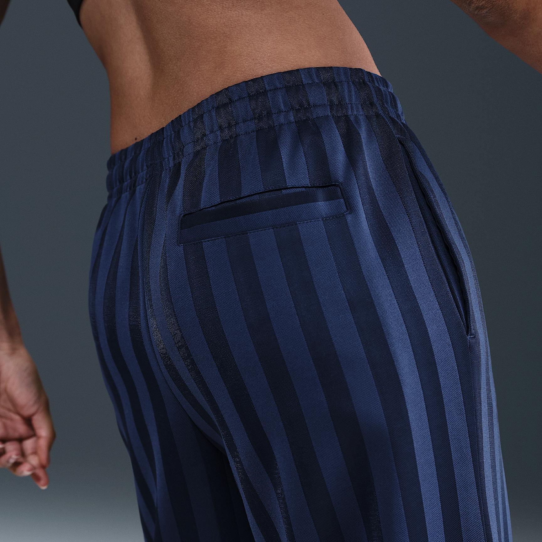 Womens Nike Sportswear Mid-Rise Loose Jacquard Striped Track Pants | HV5133-110 Product Image