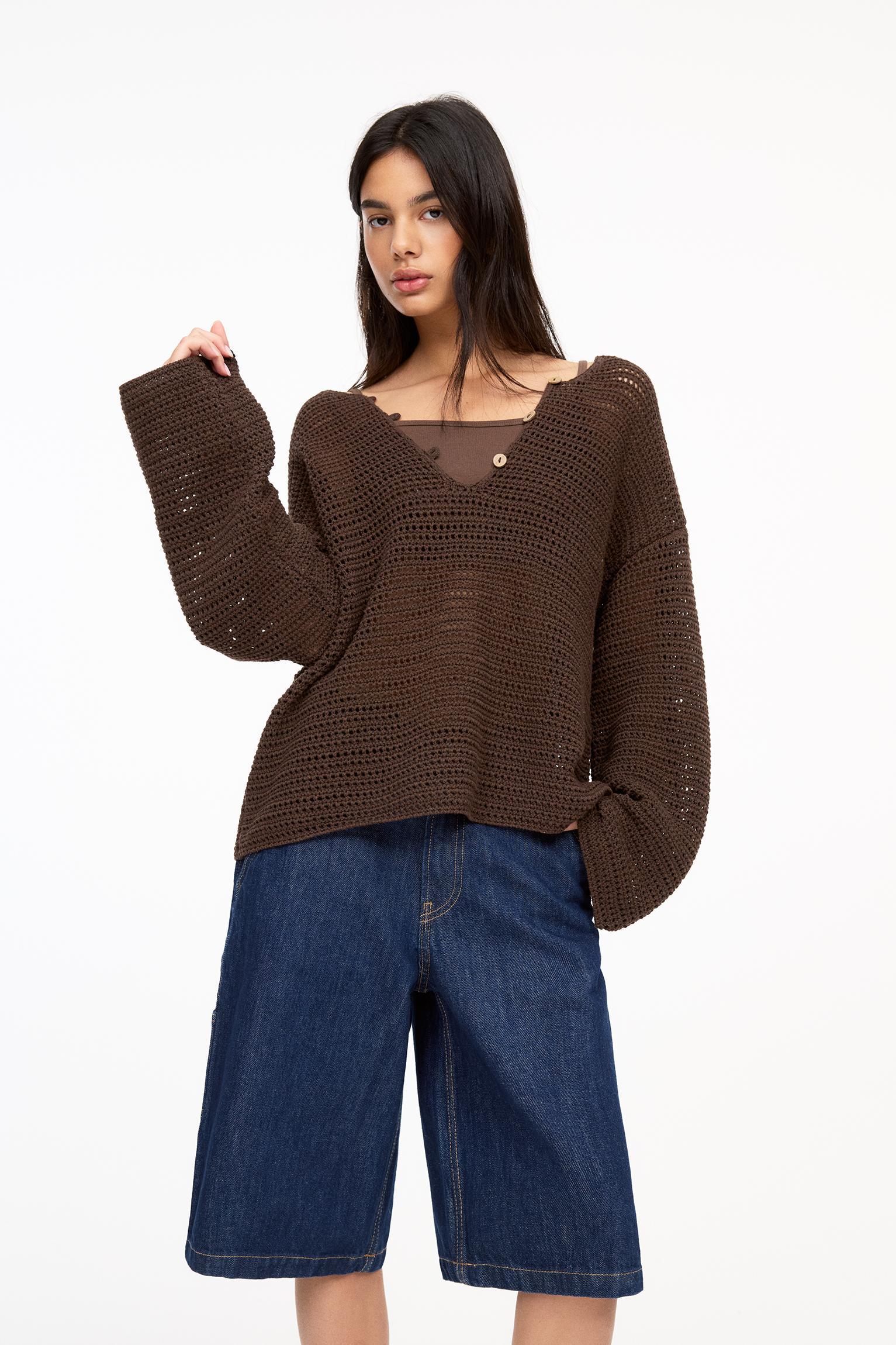 Open knit sweater with buttons Product Image