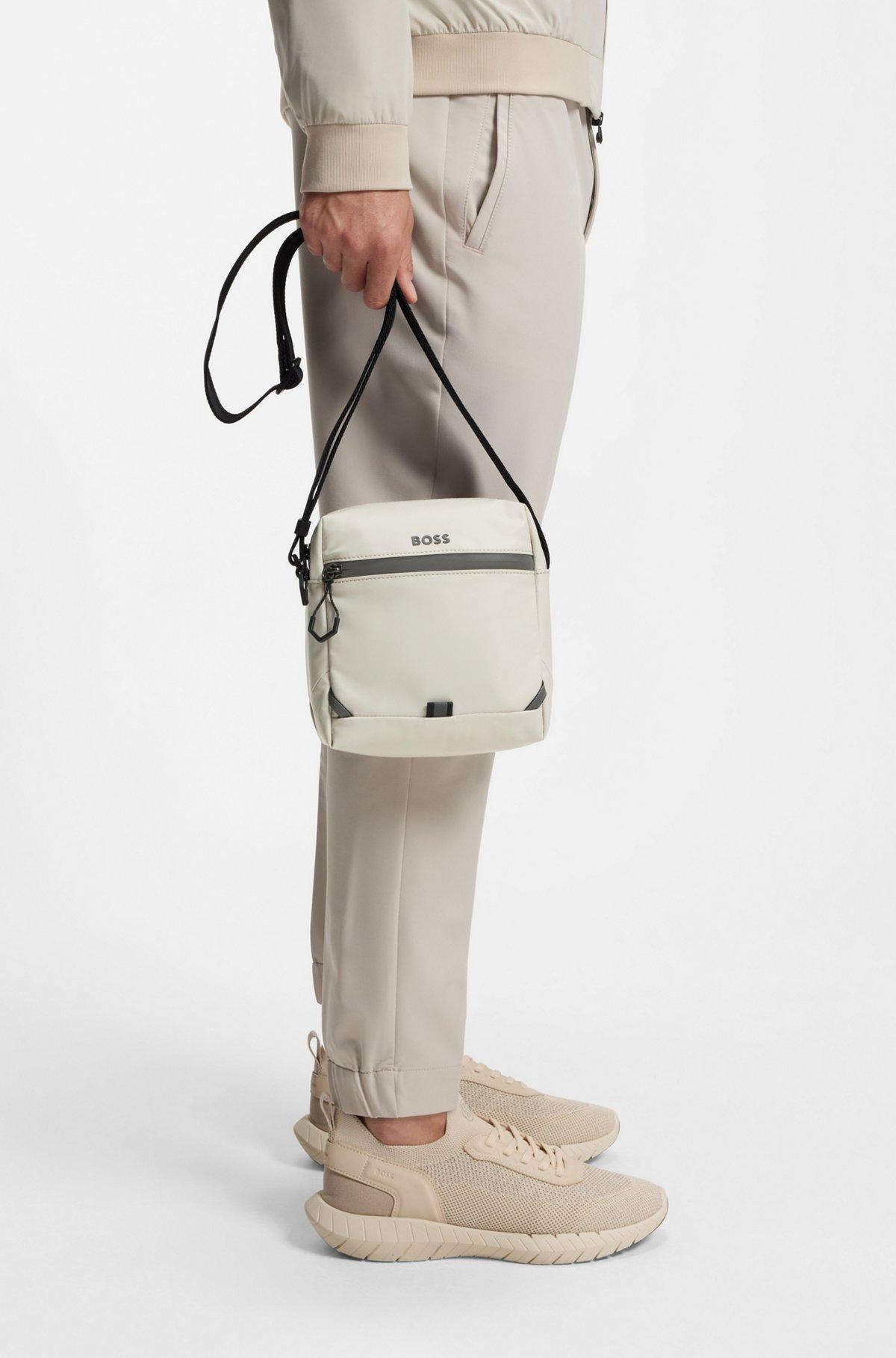 Reflective-detail reporter bag in faux leather Product Image