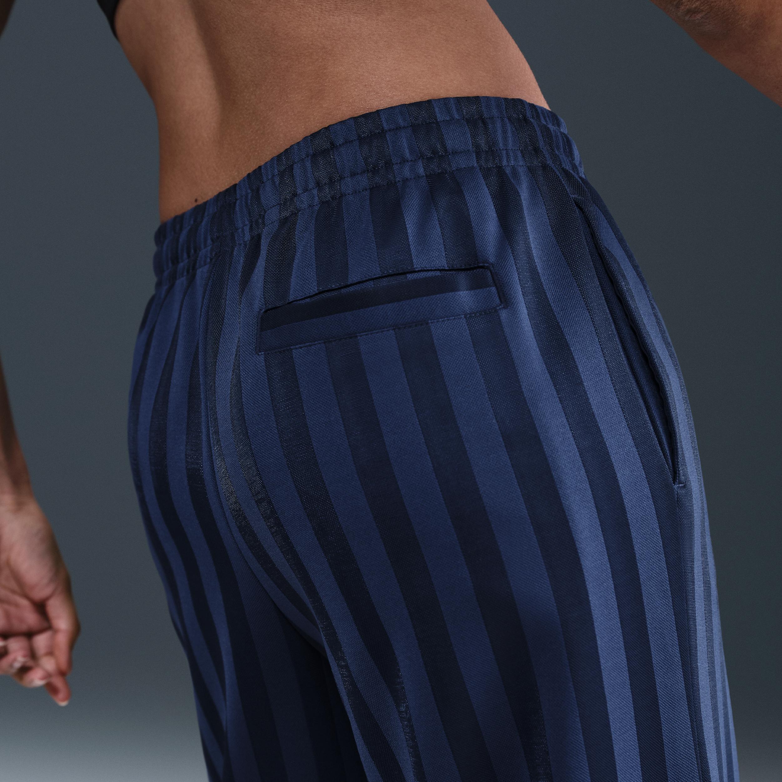 Womens Nike Sportswear Mid-Rise Loose Jacquard Striped Track Pants | HV5133-110 Product Image