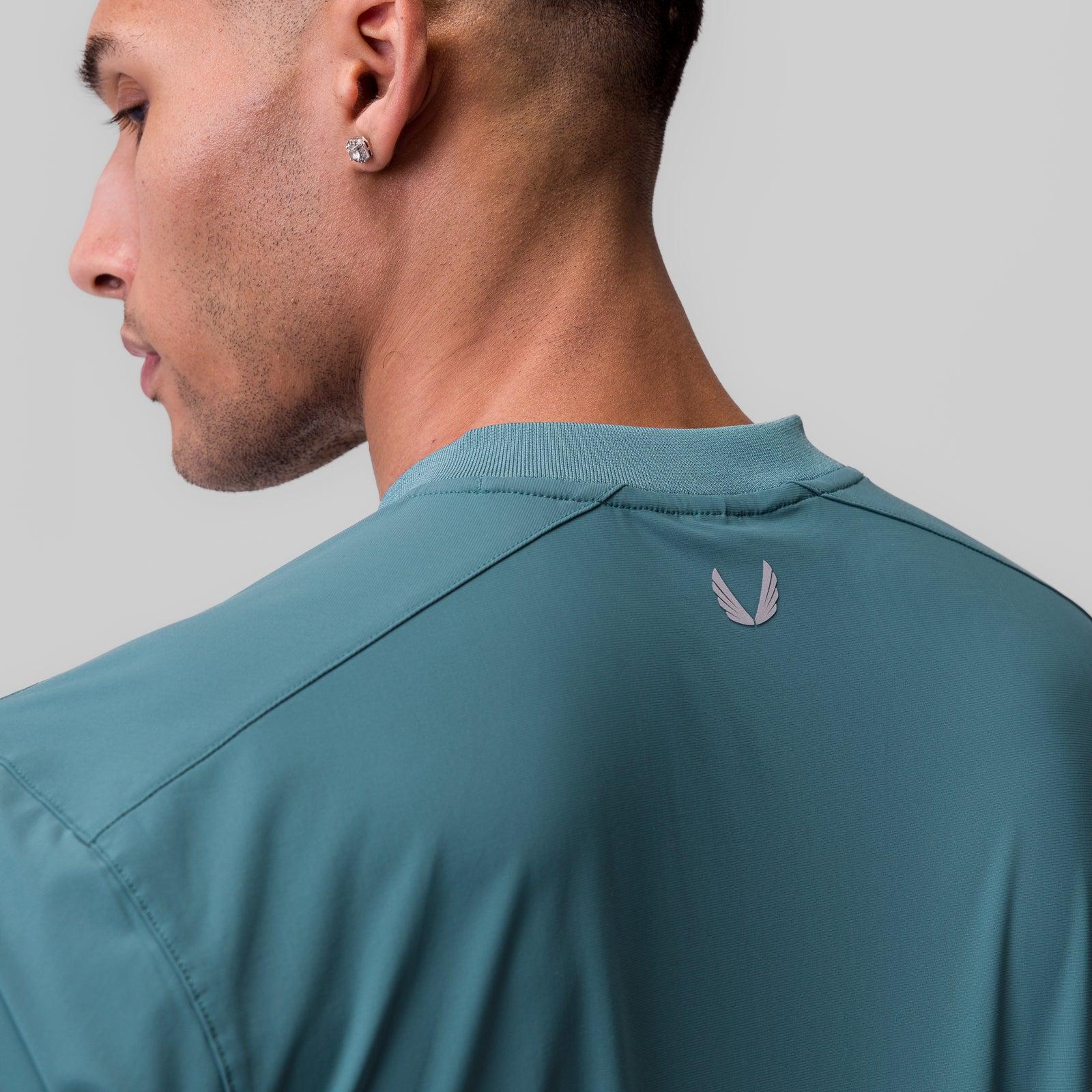 1087. Tetra-Lite® Ice Zip Tee - Storm Product Image