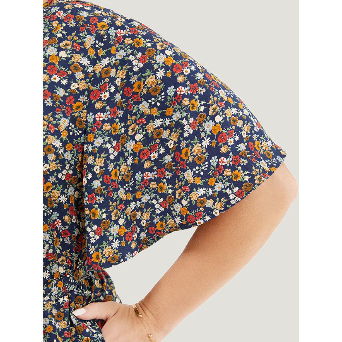 Plus Size DarkBlue Ditsy Floral Flutter Sleeve Pocket Belted Wrap Jumpsuit Women Elegant Short sleeve V-neck Dailywear Loose Jumpsuits BloomChic 30/6X Product Image
