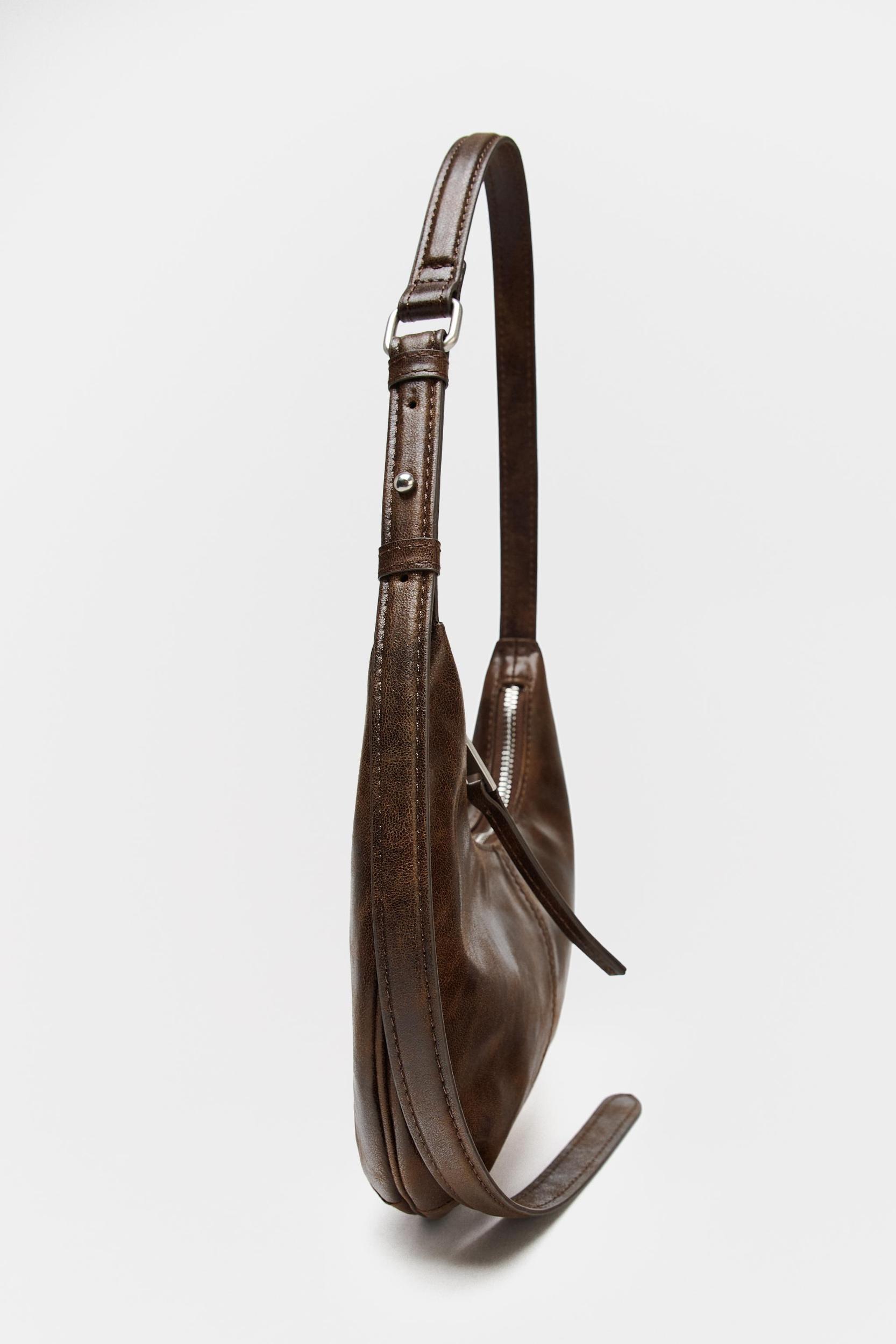 DISTRESSED EFFECT SHOULDER BAG Product Image