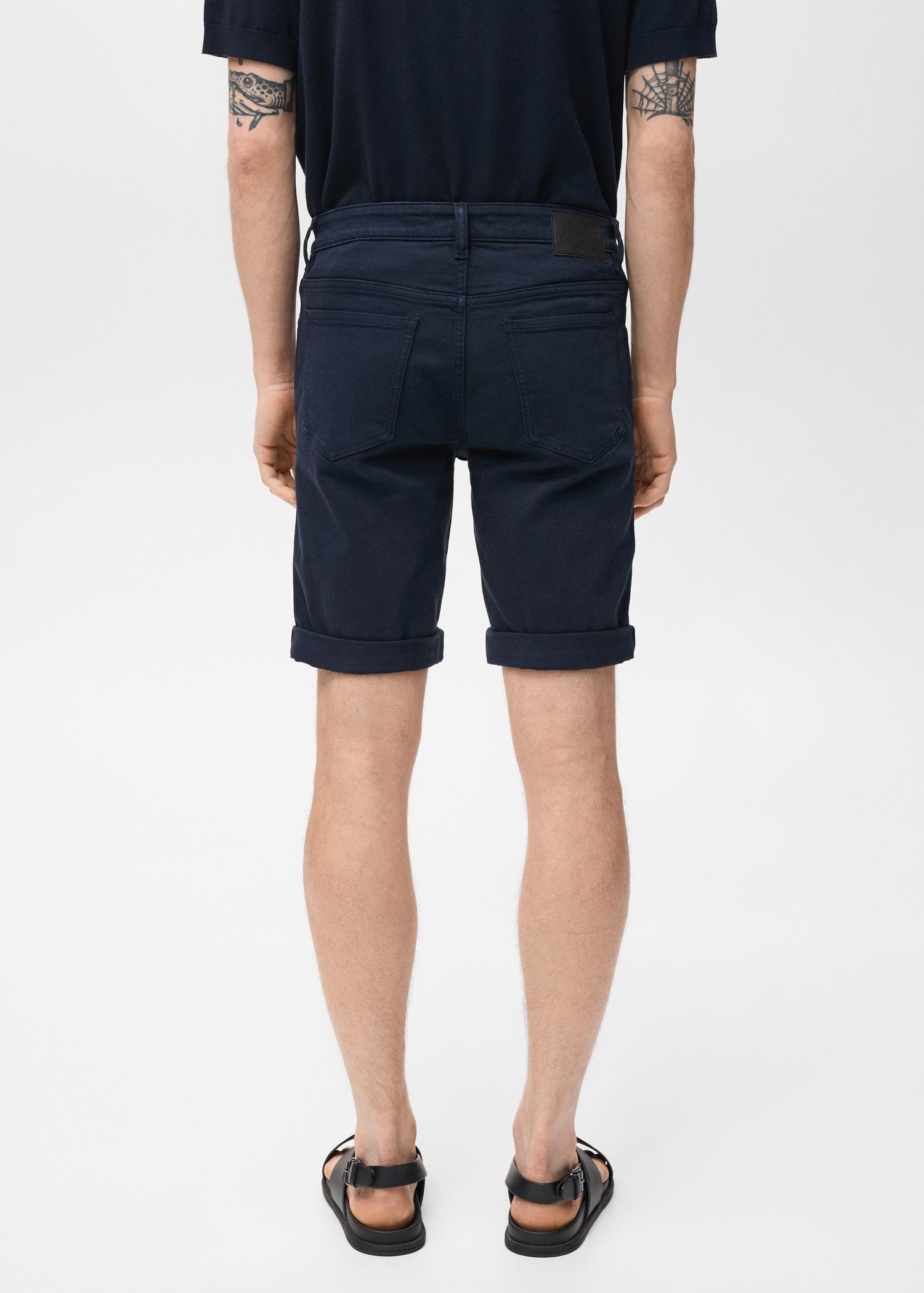 Slim-fit denim bermuda shorts - Men | MANGO USA Product Image