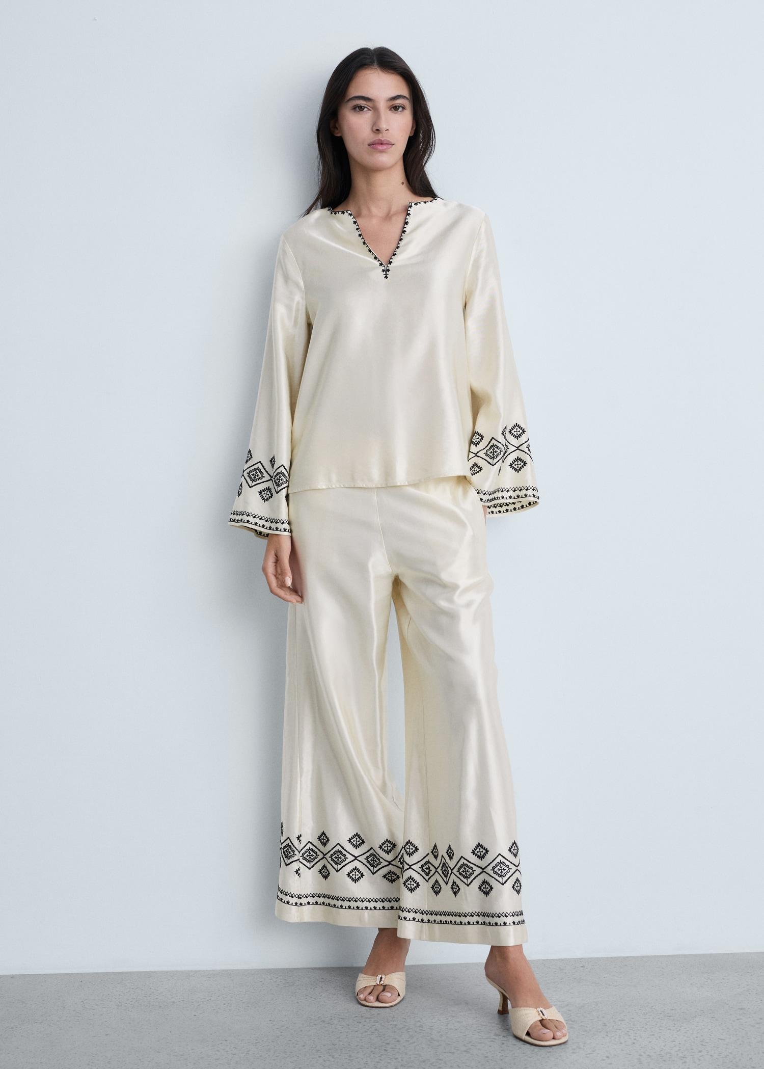 Wide-leg pants with embroidered hem - Women | MANGO USA Product Image