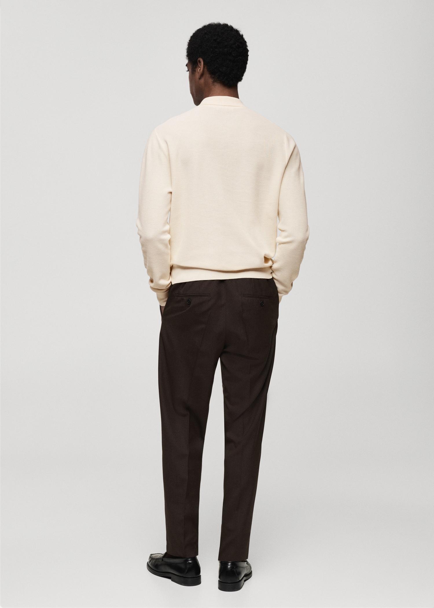 Micro-structured cotton knitted polo shirt - Men | MANGO USA Product Image