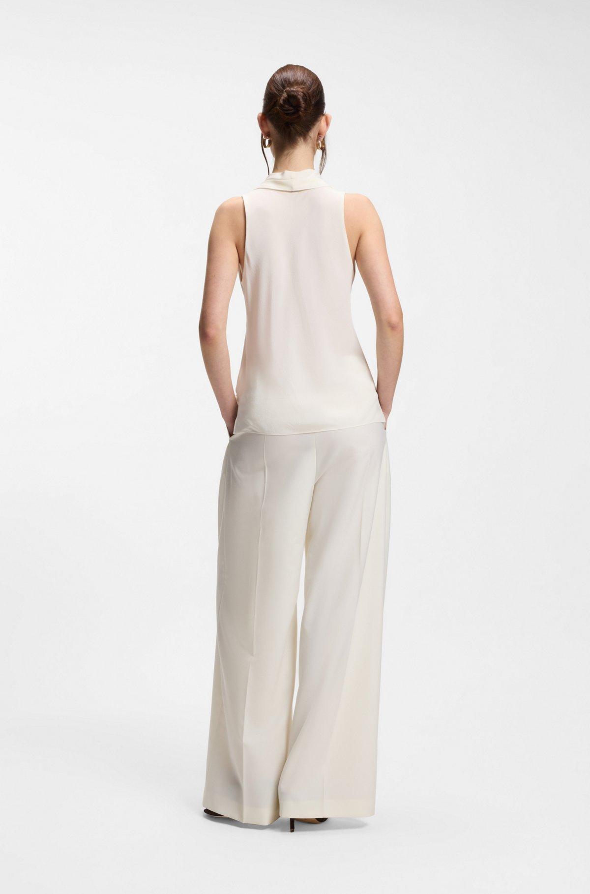 Sleeveless blouse in sandwashed silk with V neckline Product Image