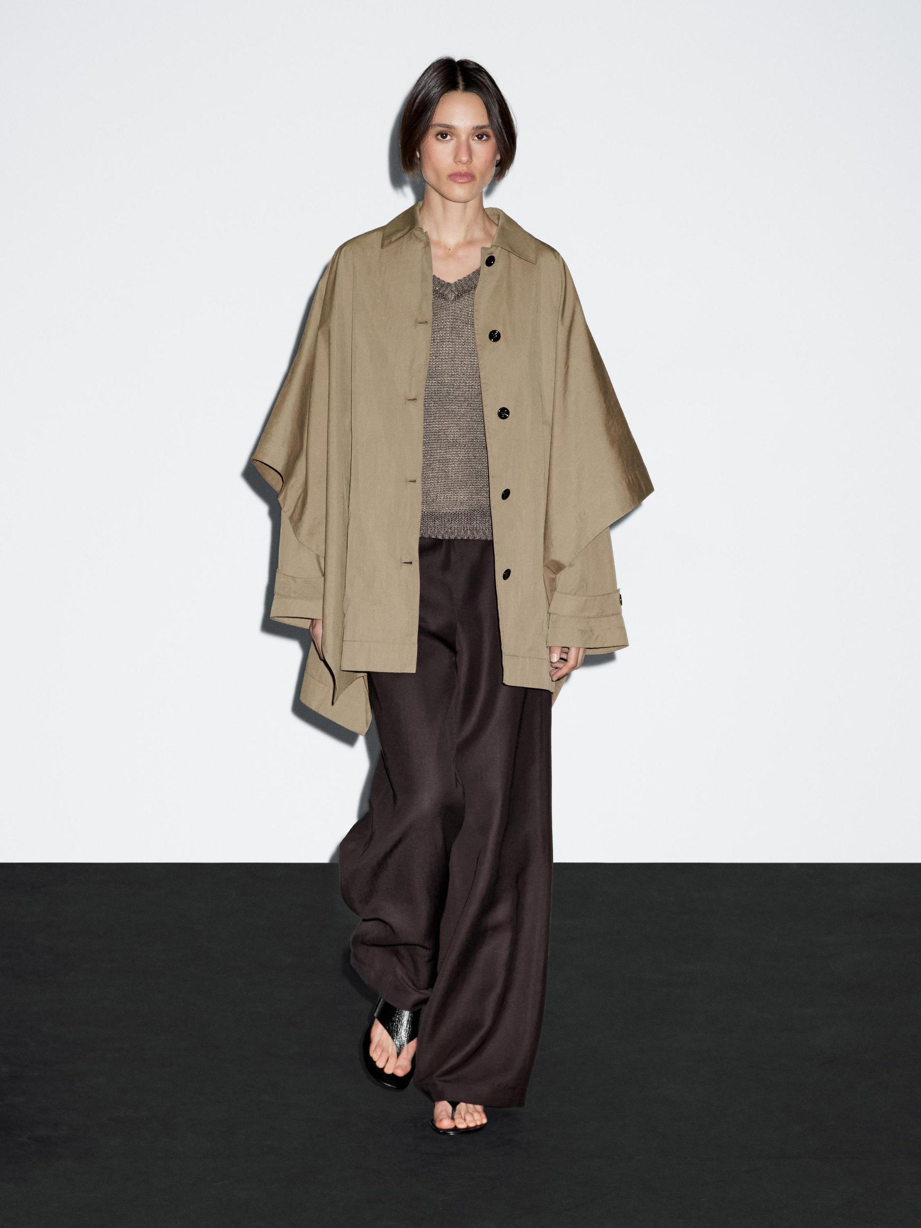 Cape trench coat with long sleeves Product Image