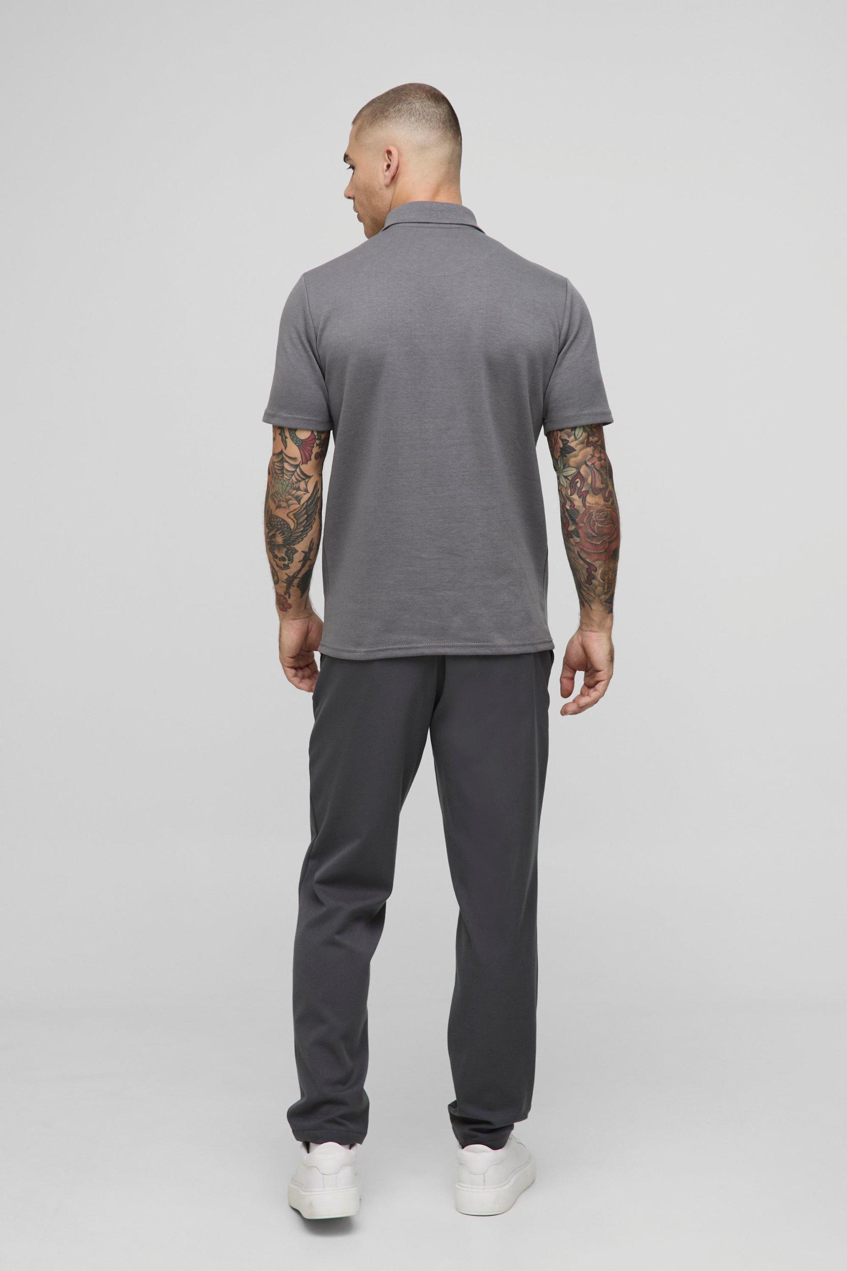 Slim Panelled Zip Neck Interlock Polo | boohooMAN USA Product Image