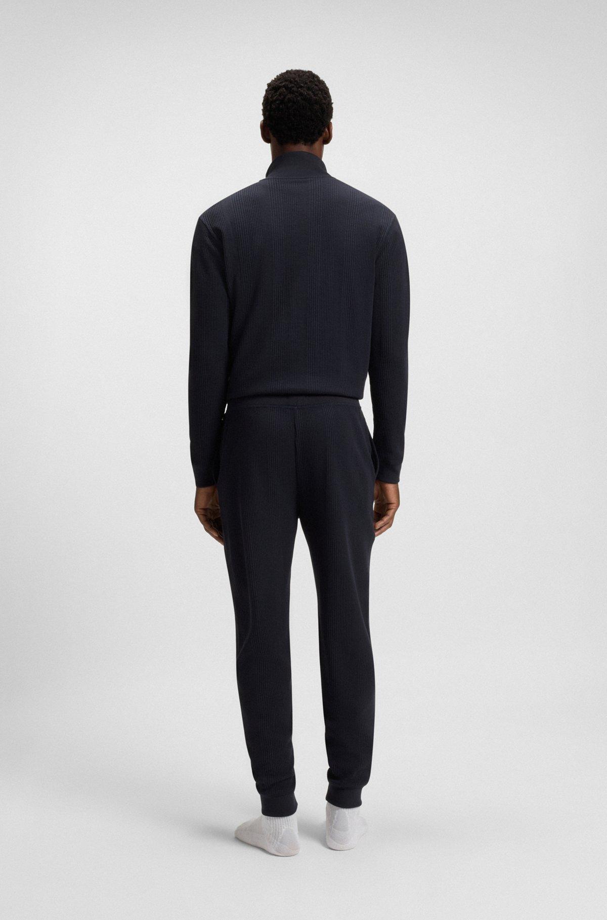 Cotton tracksuit bottoms with embroidered logo Product Image