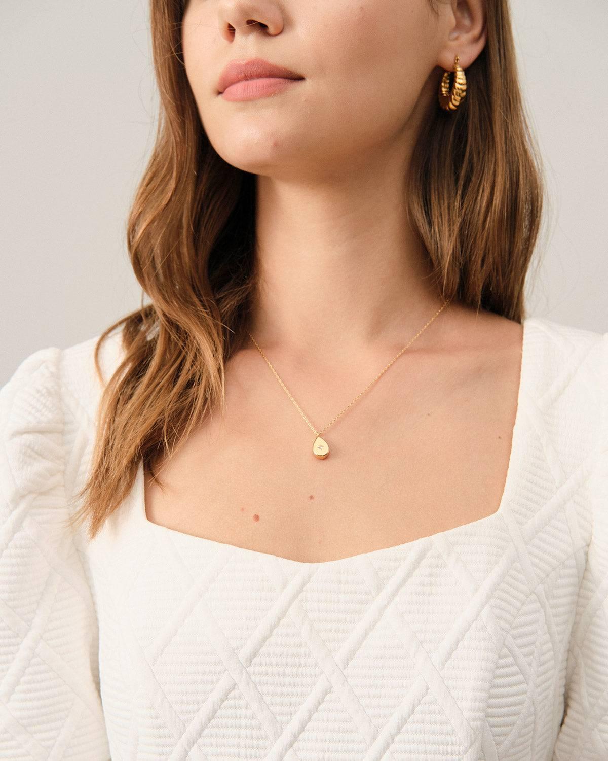 The Solid Textured Puff Sleeve Mini Dress Female Product Image