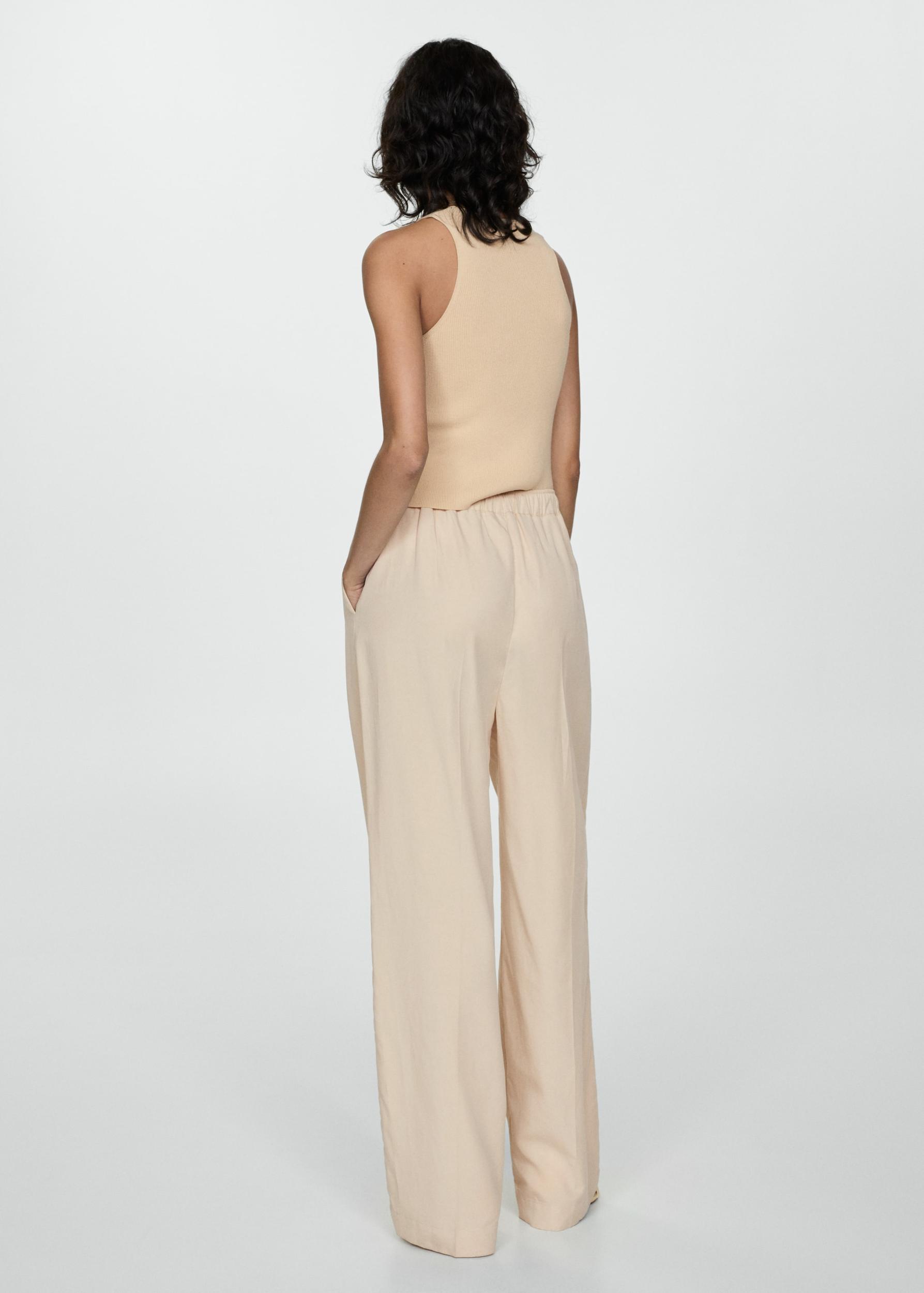 Lyocell pleated pants - Women | MANGO USA Product Image