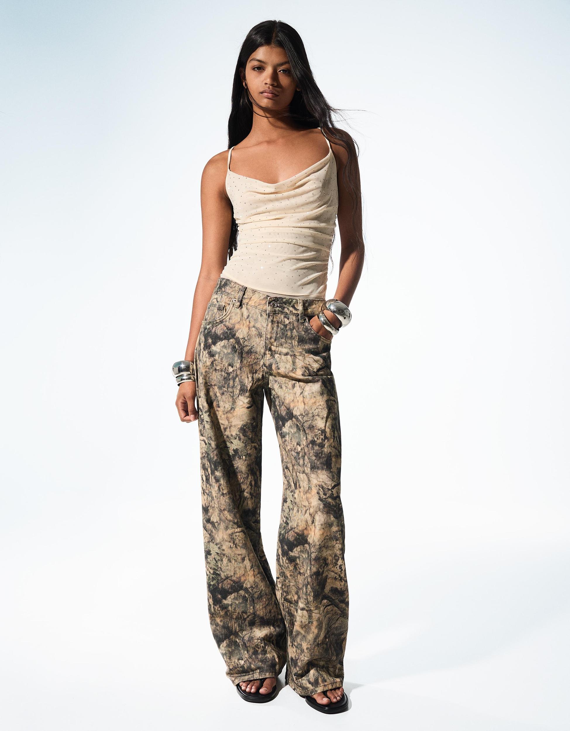 Rhinestone mesh bodysuit with straps Product Image