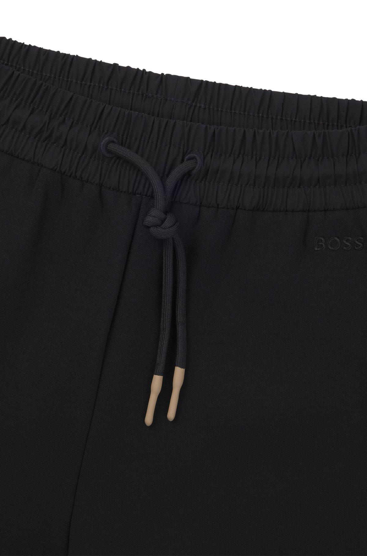 BOSS - Tracksuit bottoms with adjustable hems - Black Product Image