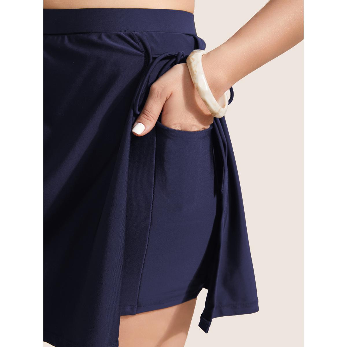 Plus Size High Rise Tie Knot Side Pocket Swim Bottom Women's Swimwear Black Beach Tie knot High stretch Bodycon High Rise Slanted pocket Curve Swim Bottoms BloomChic 26/4X Product Image