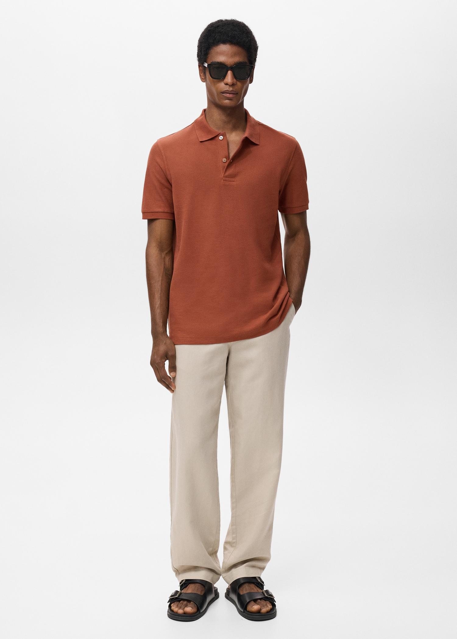 Regular-fit cotton piqué polo shirt - Men | MANGO USA Product Image