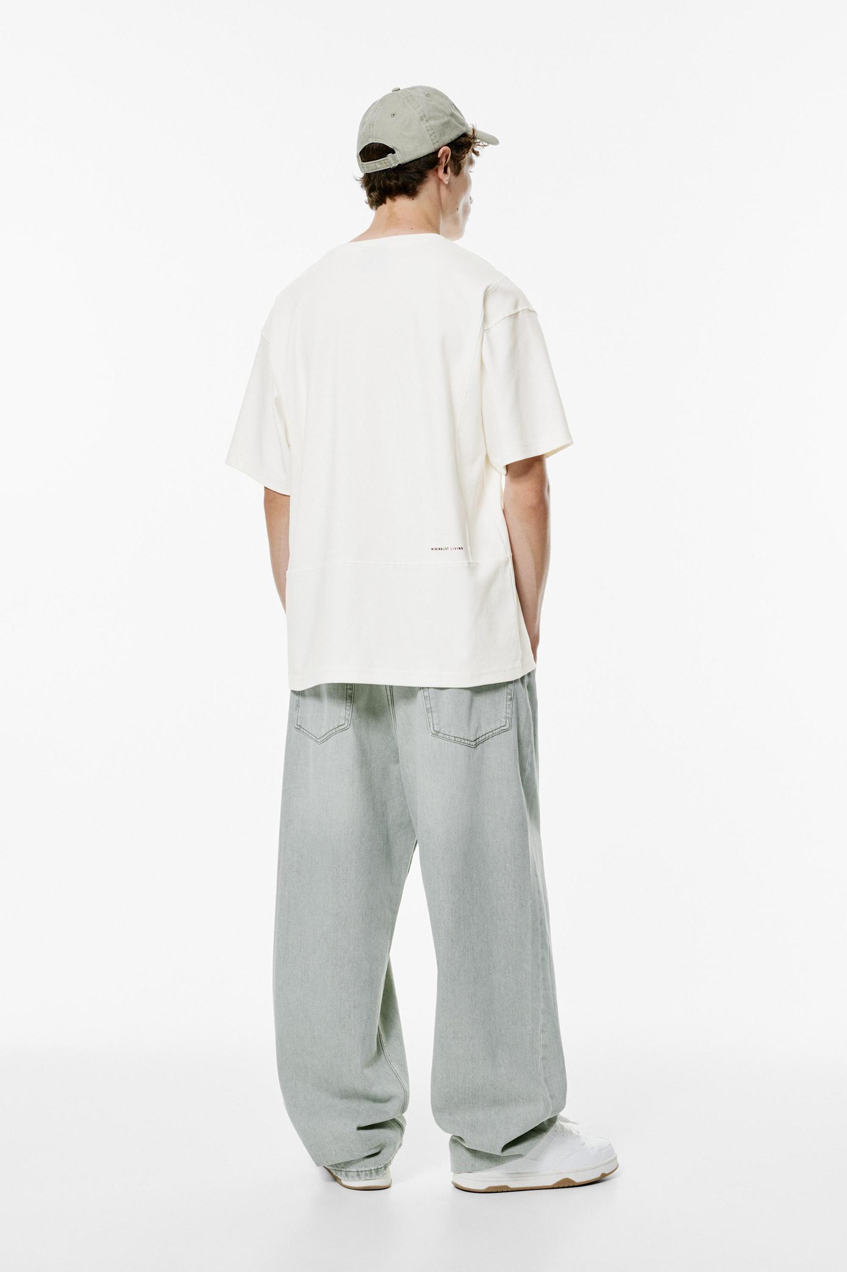 Short sleeve sweatshirt with slogan Product Image