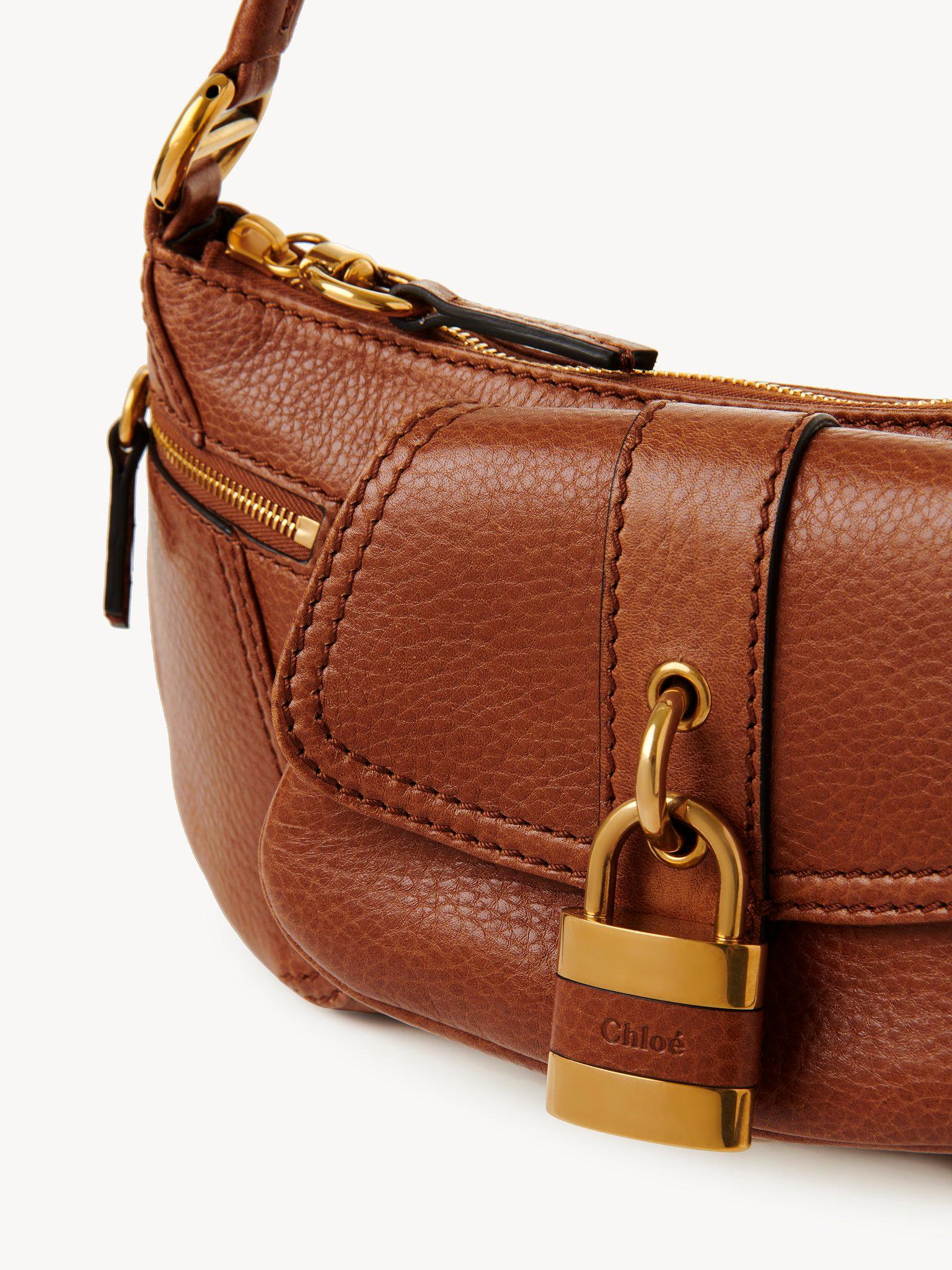 The 99 shoulder bag in grained leather Product Image