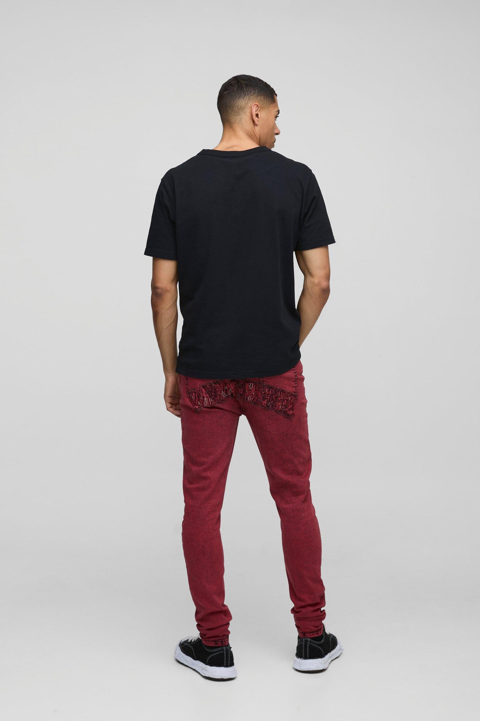 Skinny Stretch Acid Wash Applique Denim Jeans | boohooMAN USA Product Image