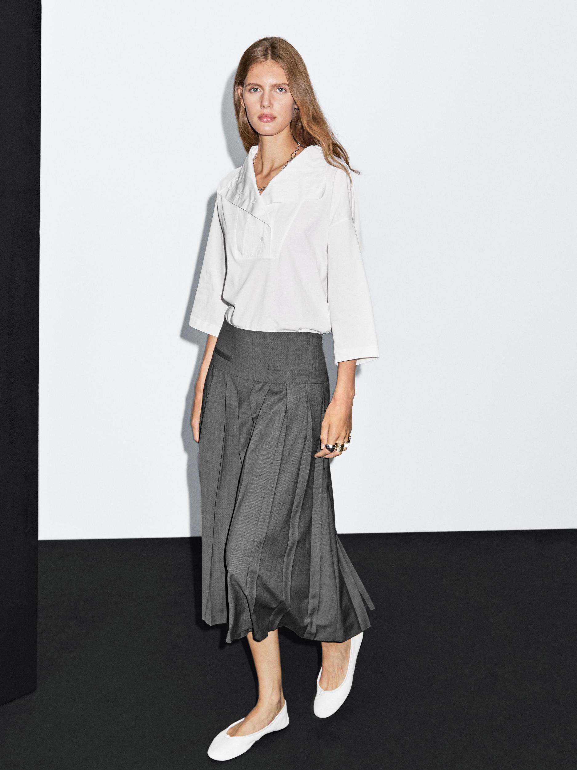 Midi skirt with box pleats Product Image