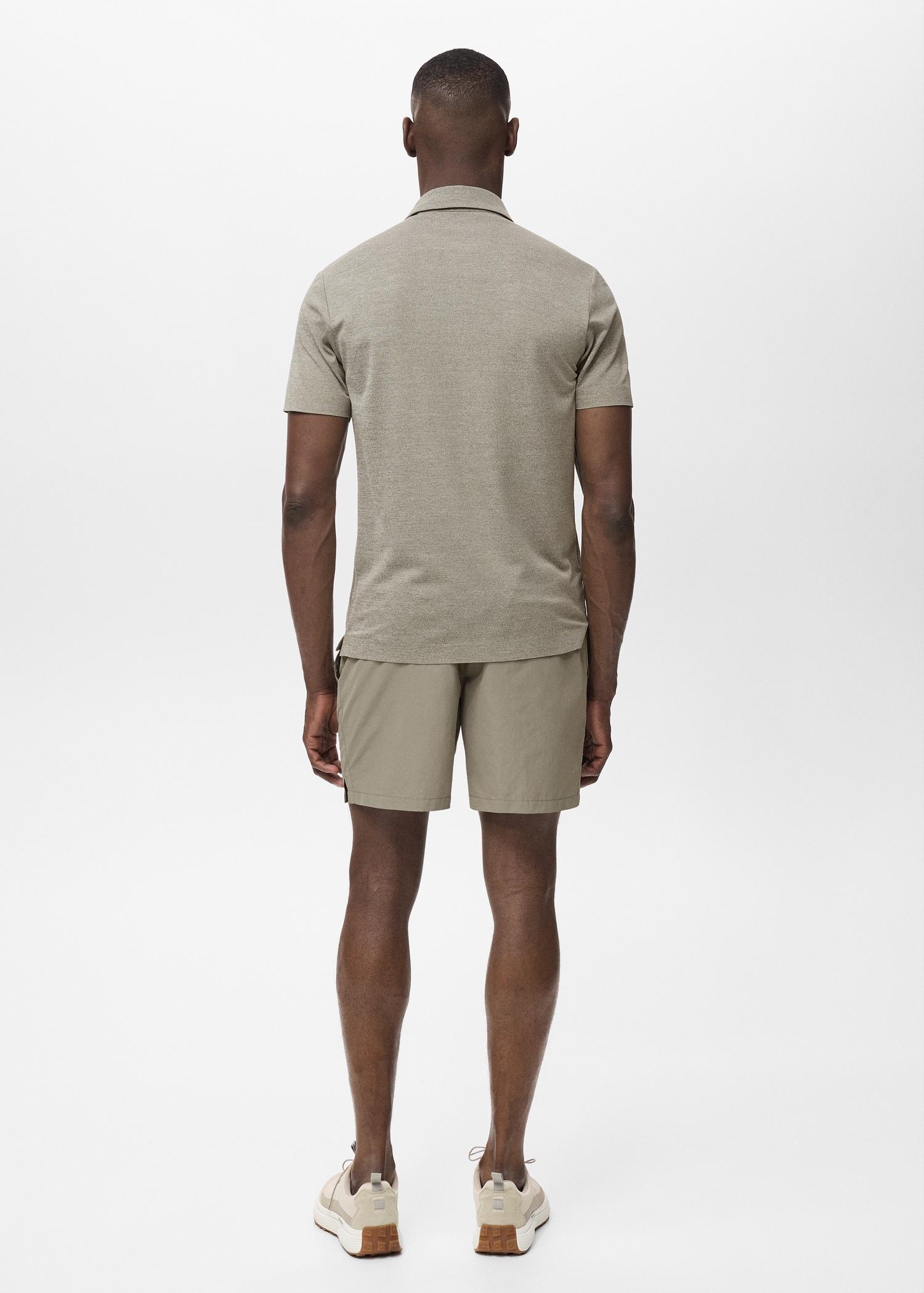 COOLMAX® slim-fit polo shirt - Men | MANGO USA Product Image