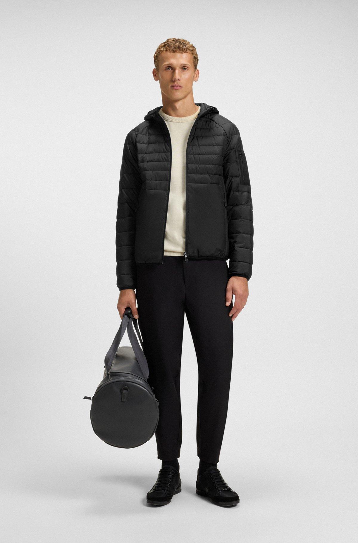 Water-repellent hooded jacket with decorative reflective details Product Image