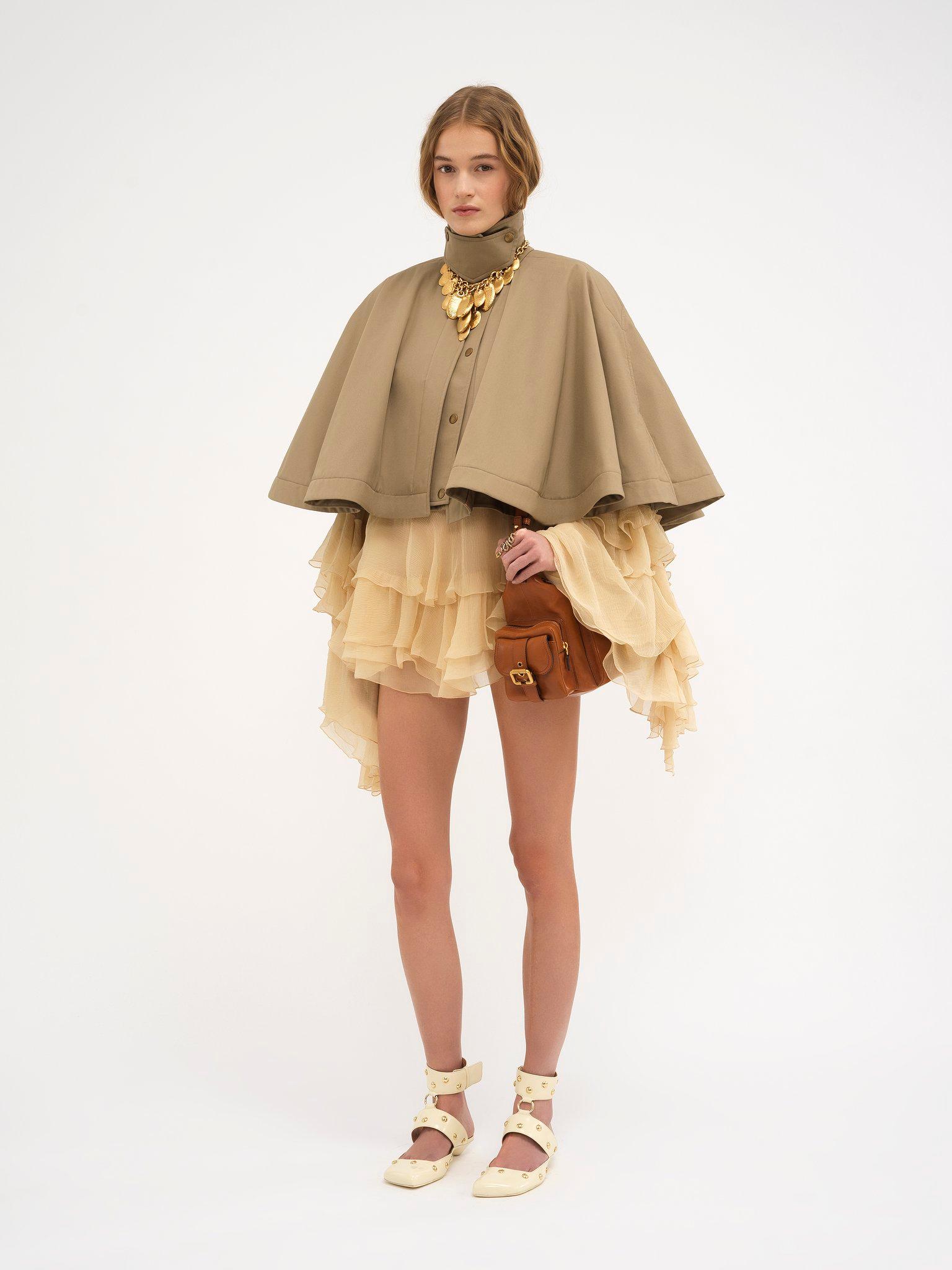 Short quilted cape in cotton gabardine Product Image