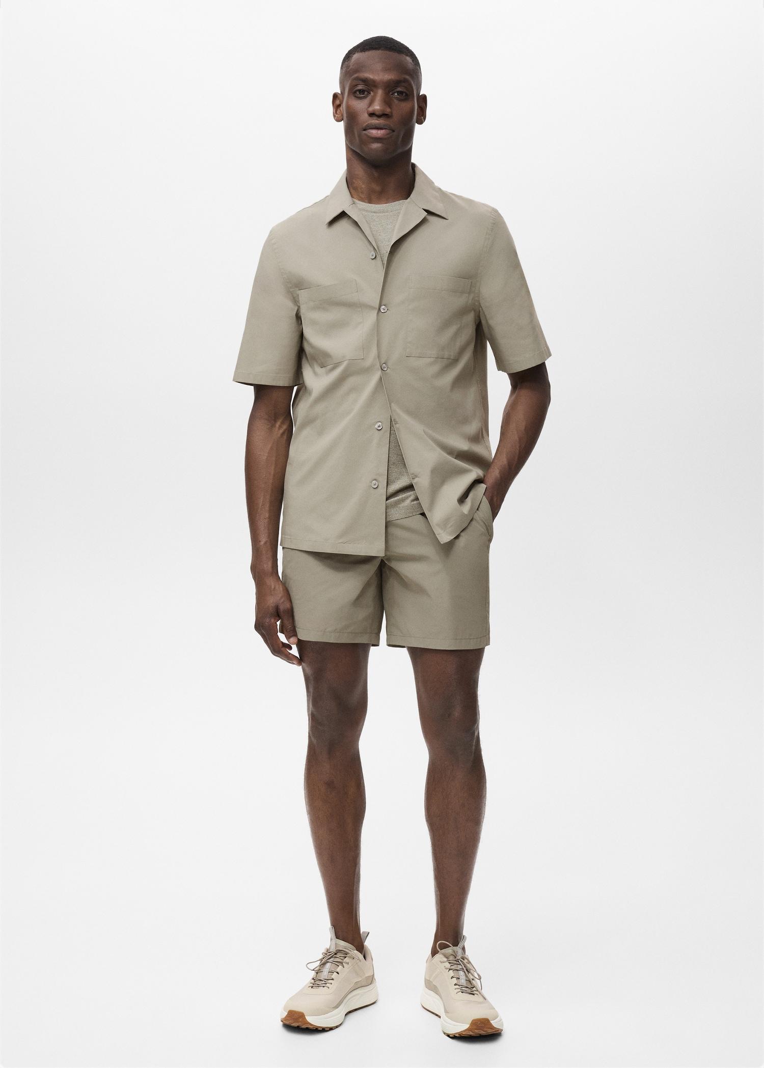 Shirt with pockets and bowling collar - Men | MANGO USA Product Image