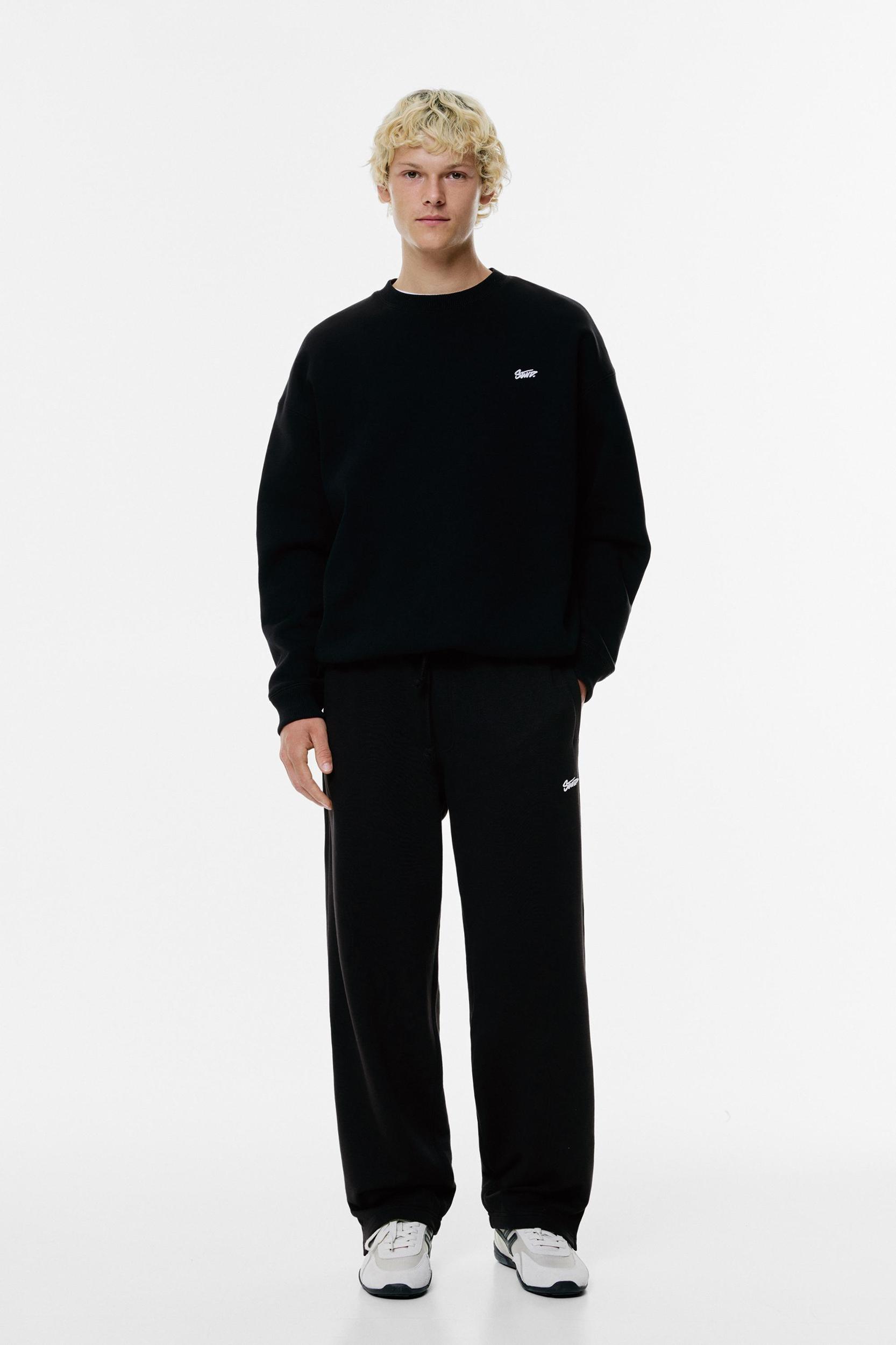 Jogger sweatpants with slits Product Image