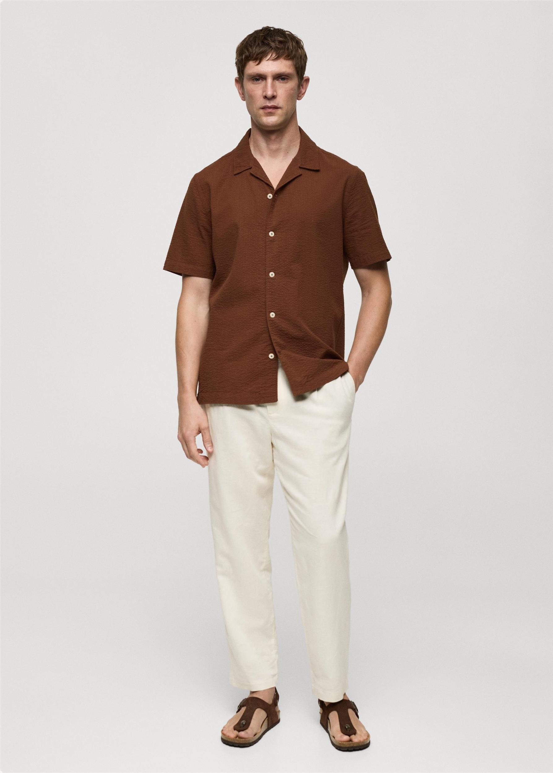 Regular-fit 100% seersucker cotton shirt - Men | MANGO USA Product Image