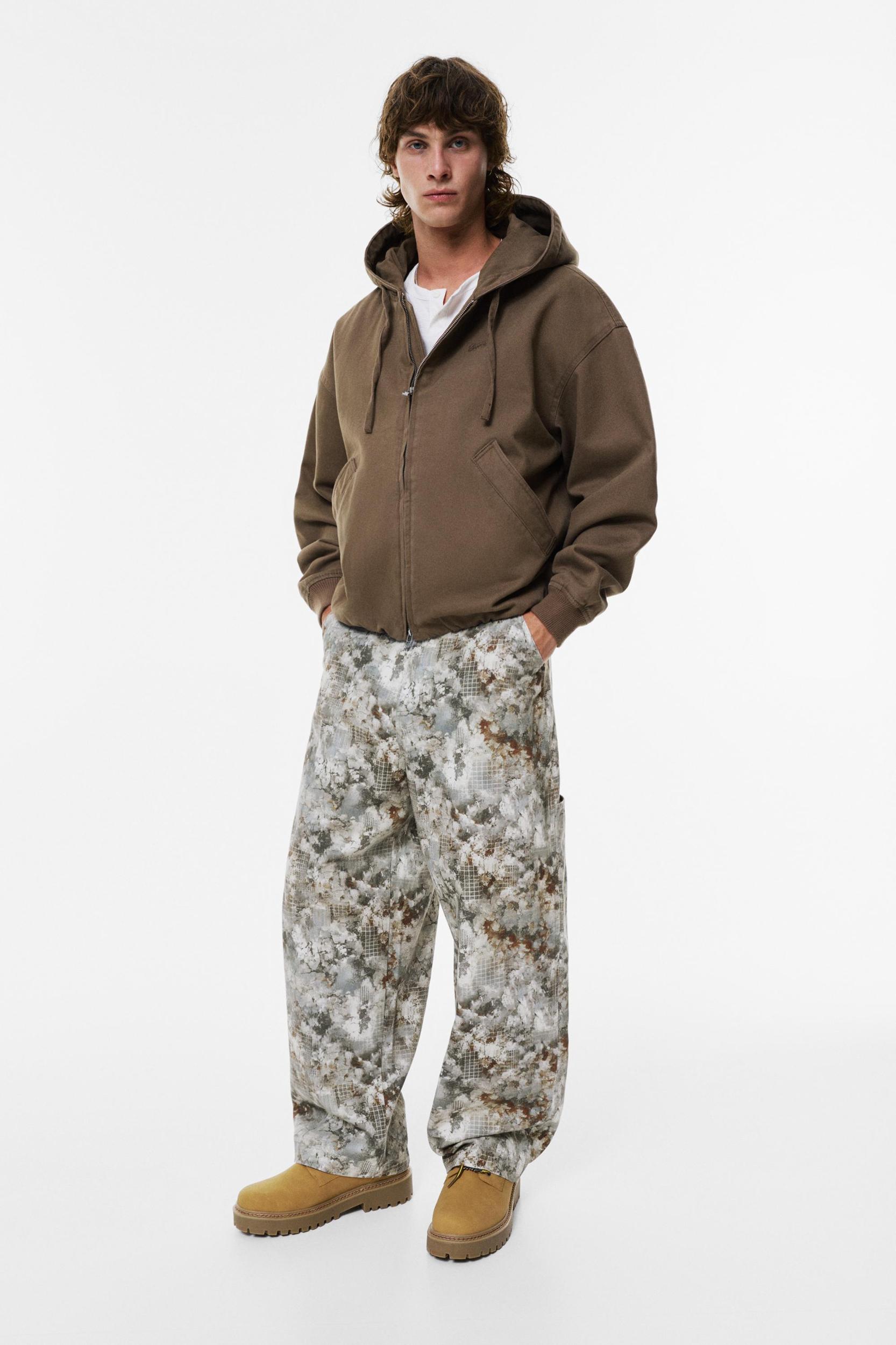 Camouflage print carpenter jeans Product Image