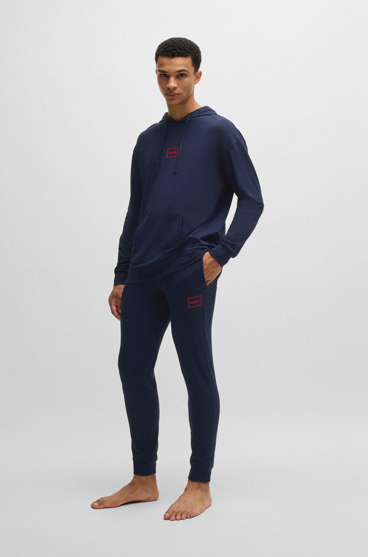 Logo-print tracksuit bottoms in stretch cotton Product Image