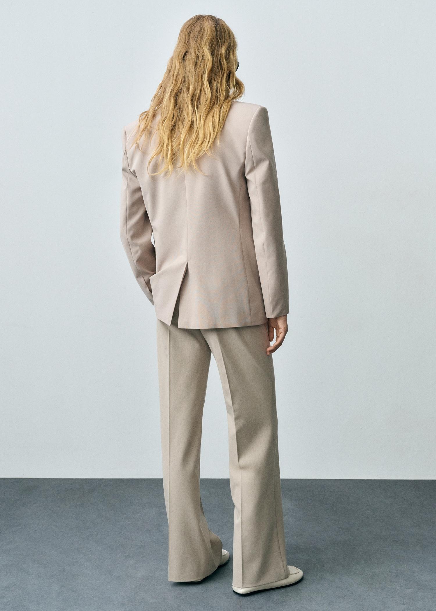 Mid-rise flare pants - Women | MANGO USA Product Image
