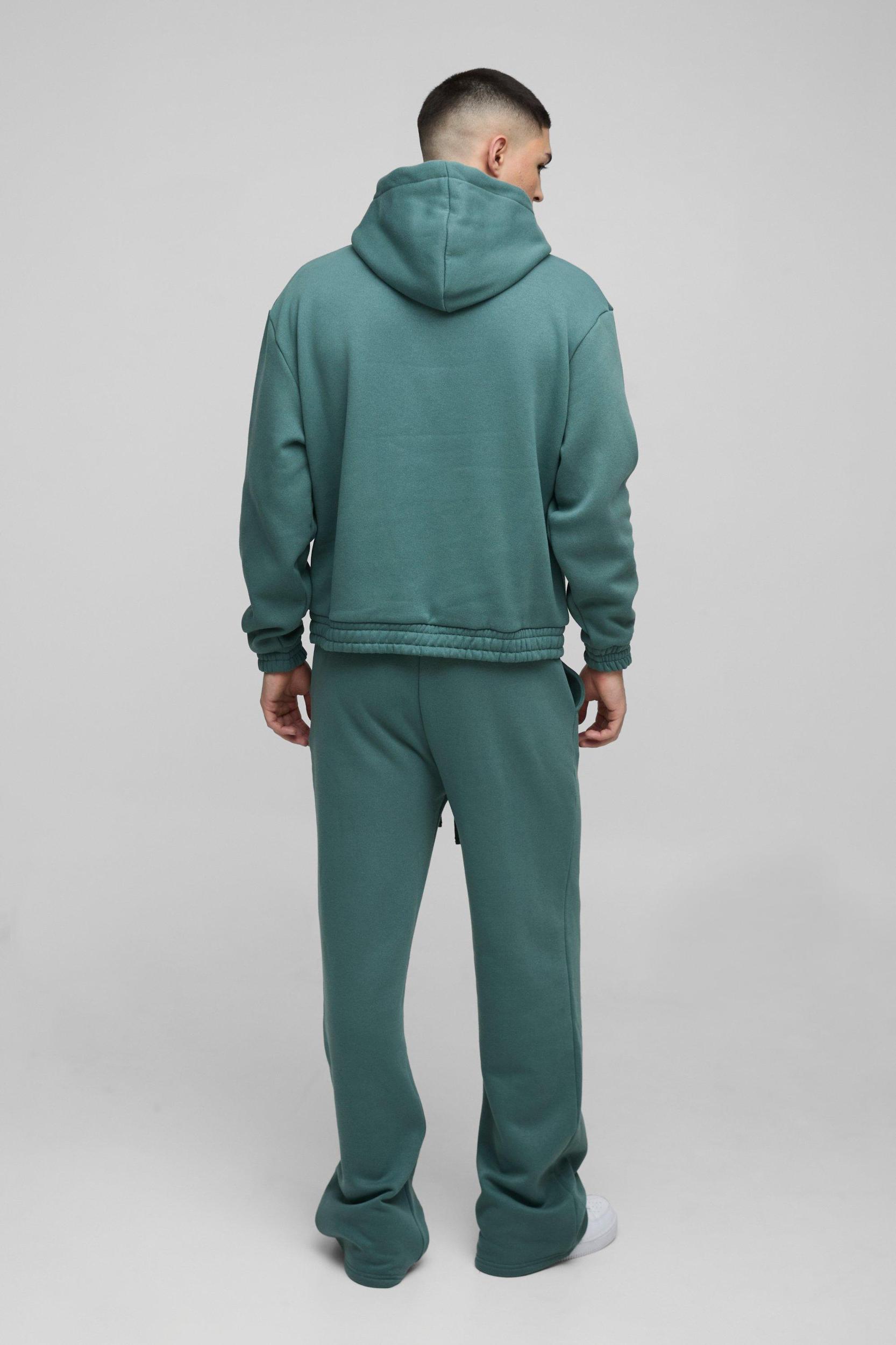 Oversized Boxy Flare Stacked Hooded Tracksuit With Rubber Badge | boohooMAN USA Product Image