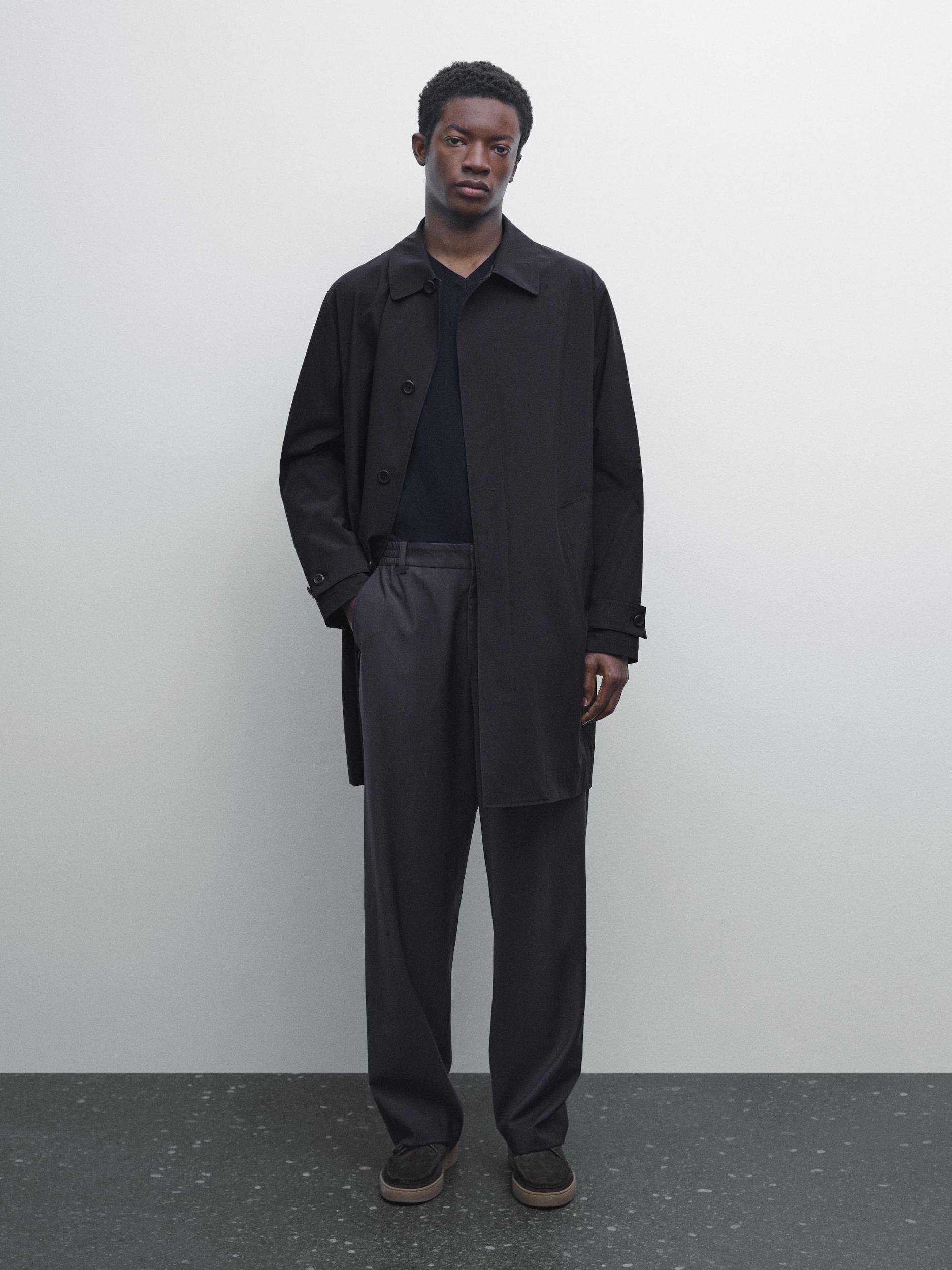 Lightweight trench coat with hidden buttons Product Image