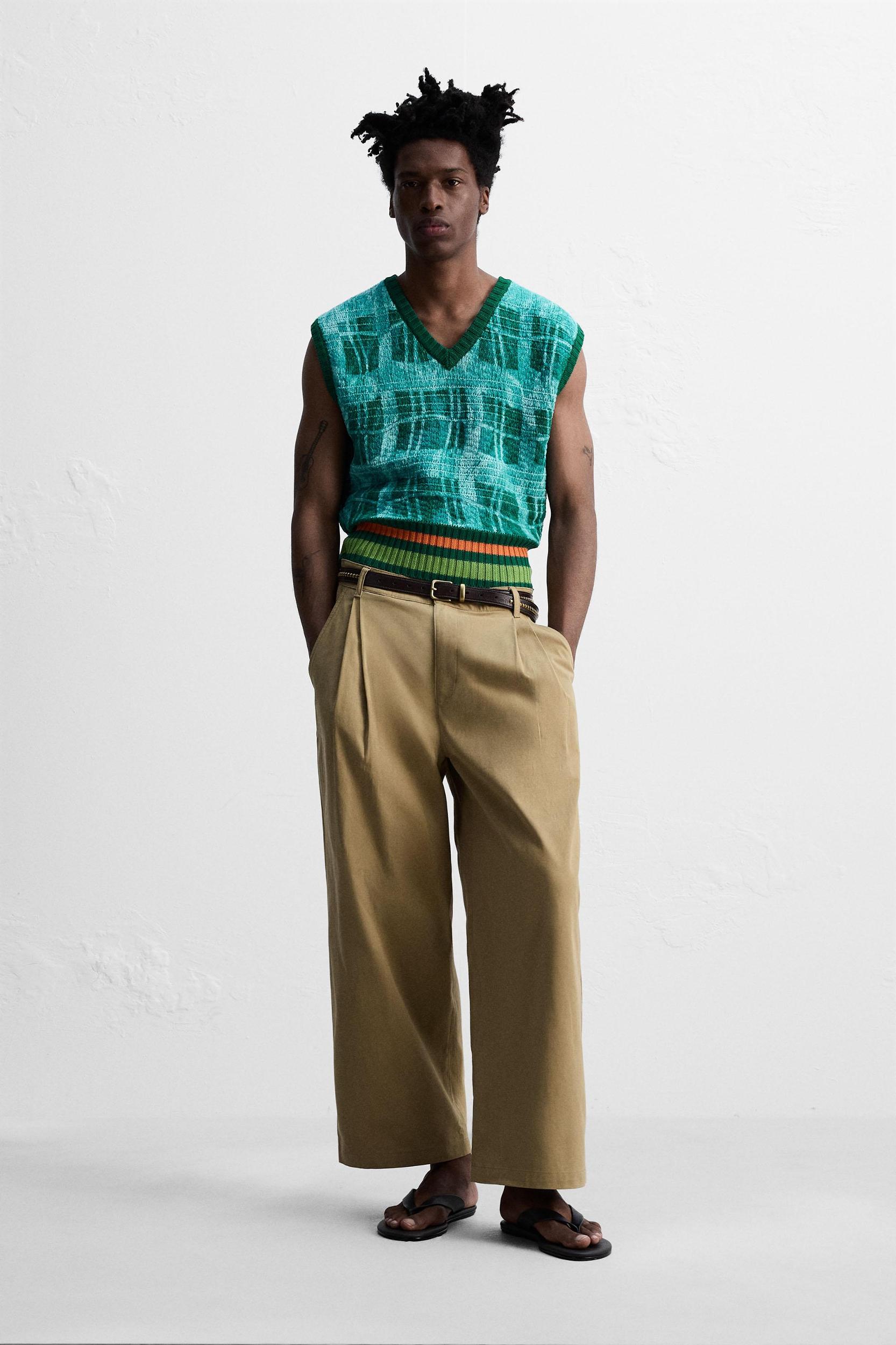 PLEATED WIDE FIT PANTS Product Image