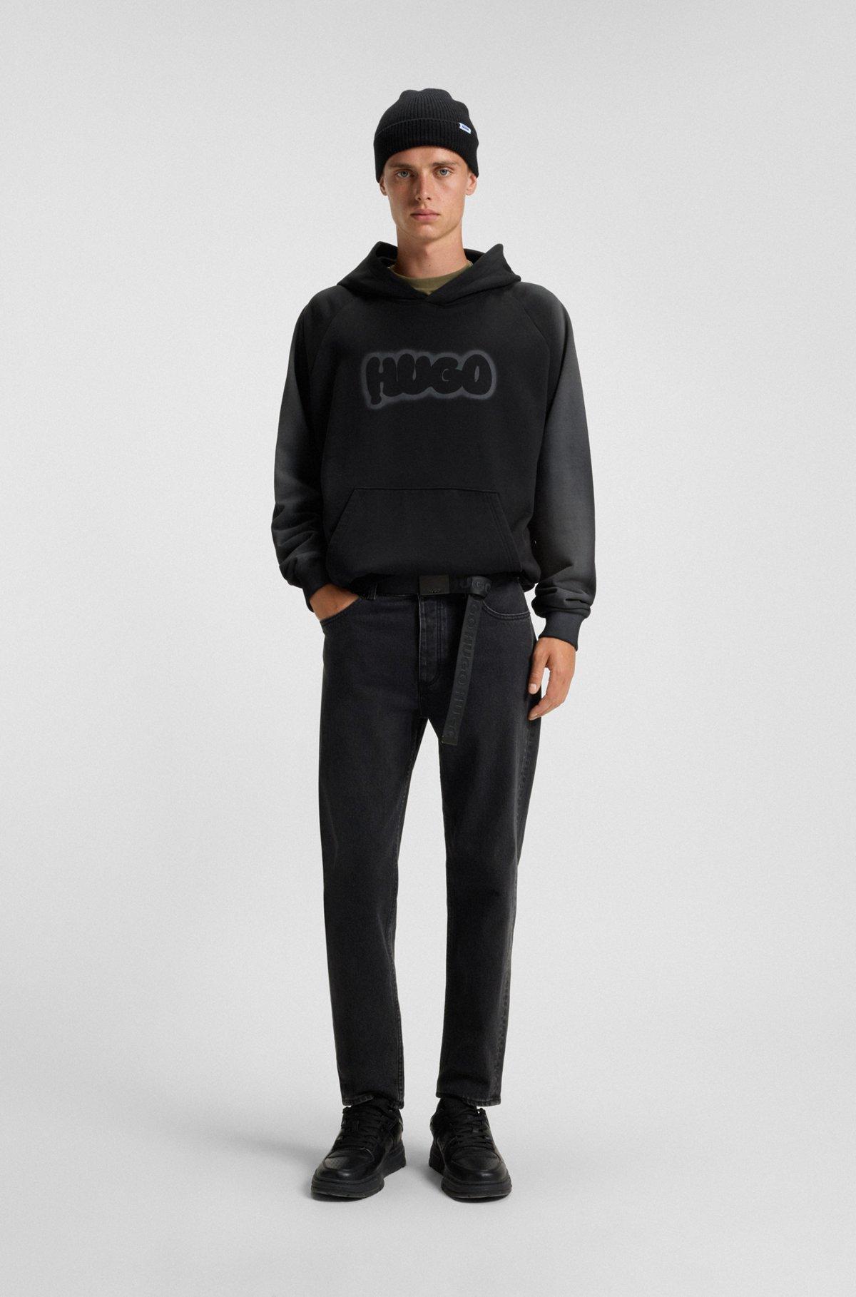 Tapered-fit jeans in grain-effect black denim Product Image