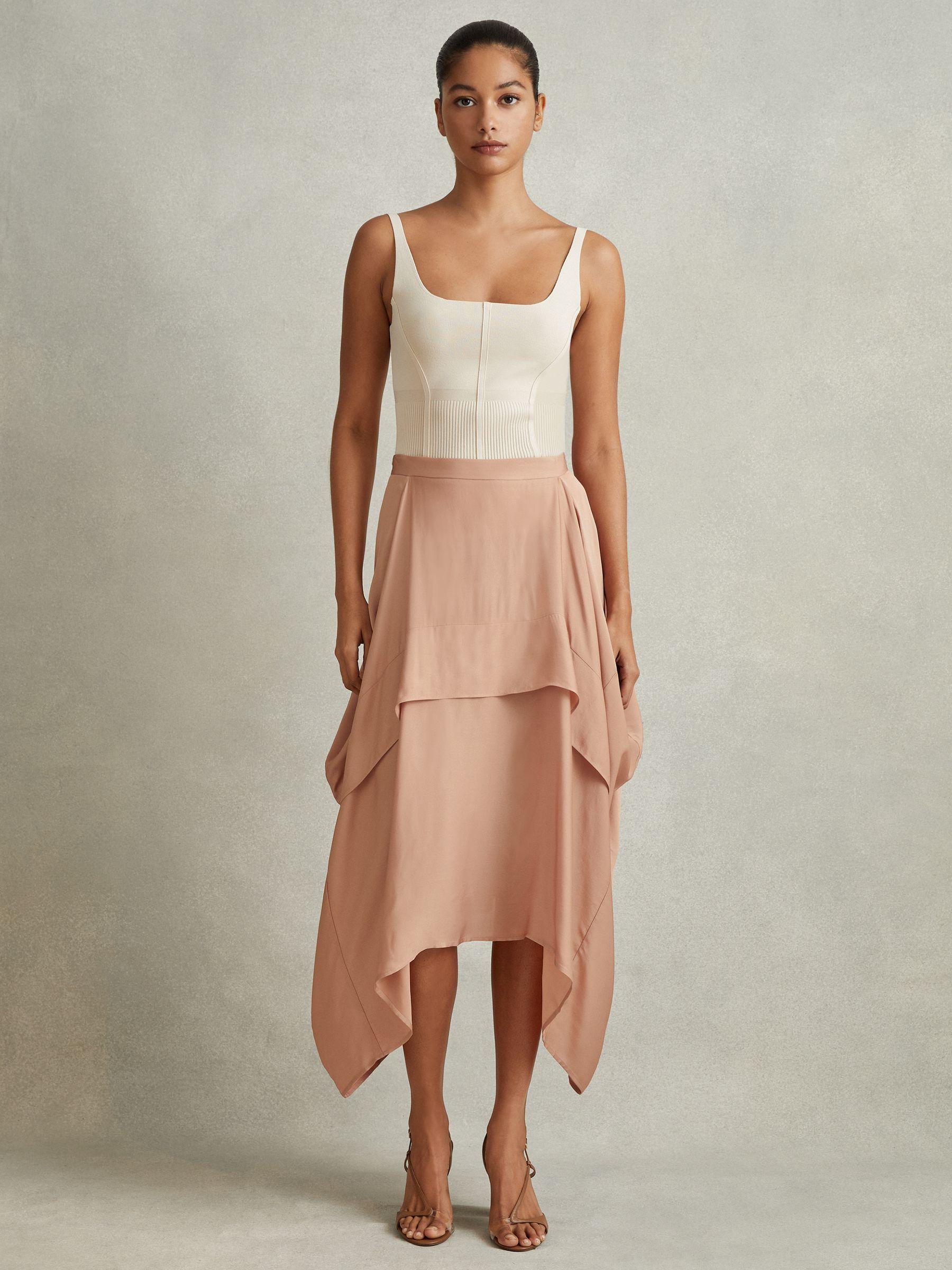 Side Pleat Asymmetric Midi Skirt in Nude Product Image